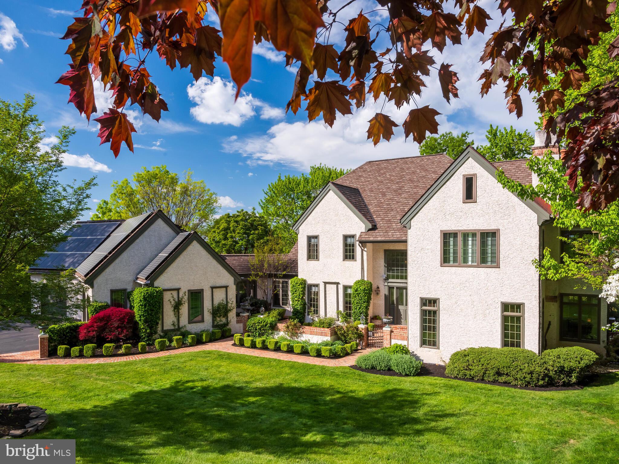 Offers due Wed 5/15 and sellers will review on 5/16. Welcome to 425 Freedom View Ln, a stunning 5-bdrm,3.1-bth/In Main House, cust.-built estate on .85 prof. landscaped acres in a quiet cul-de-sac. Nestled in the picturesque landscape of Valley Forge Mountain, this home includes a beautiful separate & private in-law suite feat. private entrance & separate garage space, perfect for family/guests. The home boasts a host of seller-invested upgrades that enhance comfort & convenience while reducing utility costs. They include: Window Replacements (2017-2023, $75,000); 17.5KW Solar Power Array (2020, $60,000): generates 20+MWh annually, reducing energy bills to almost zero and providing substantial energy savings for the entire home; Gutter Drainage System (2021, $4,000); Home Cinema (2017, $25,000): w/a 4K projector, retractable screen & equipment closet; Full Electrical Panel Upgrade (2020, $20,000); Full multi-zone HVAC Replacement (Main House, 2020, $32,500, In-law Suite & Garage, 2022, $15,000): Includes 3 energy-efficient multi-stage heat pumps with gas auxiliary, variable speed blowers & humidity control with smart thermostats; Insulated Garage Doors & Wifi enabled Motors (2022, $14,000); Ethernet Network Cabling (2021, $750); Kitchen Appliance Replacement (2020, $5,000): dual oven, dishwasher, wine fridge, and range; Interior Painting (2023-2024, $30,730); Intra Garage Security Door (2021, $500).Full list of installed upgrades is in available docs. As you enter this beautiful home, you're welcomed by an impressive 2-story foyer & turned staircase w/random-width oak hardwood extending throughout most of the first fl & second fl landing. The frml. living rm, w/gas fireplace, leads to the family rm & a priv. study w/gas fireplace, both offering an intimate & sophisticated atmosphere. The frml. dining rm overlooks a serene brick courtyard garden, while the gourmet kitchen opens to a spacious breakfast rm & butler's pantry. The 2-story fam. rm feats. a stunning fl to ceiling stone gas fireplace w/lg windows & an abundance of natural light. The second-fl hallway outside the Primary bdrm feat. fl to ceiling built in bookcases & sliding ladder. The primary bdrm has an abundance of windows, a lg walk-in closet & a second lg closet both w/custom cabinetry. The primary bthrm has a radiant heated fl, lg soaking tub, lg glass stall shower & heated towel rack, custom lighting, & beautiful stone throughout. Three generous sized bdrms & a full bth complete the second lvl. The finished walk out basement boasts a bdrm w/full bthrm; a state of the art home cinema; wet bar including fridge/freezer, dishwasher; & a custom work rm w/extensive cabinetry & work table. Back on the main lvl, from the breakfast rm, step outside to the rear deck that runs the entire length of the back of the house & enjoy stunning views of the canopy of trees & mountains. The lower deck enjoys a protective ceiling w/exterior fans, heating, cust. lighting, & an integrated drainage system that provides an ideal outdoor living space for all seasons. The lush perennial gardens & charming French potting shed w/cedar interior offer a tranquil retreat. The 3-air conditioned & heated lg garage spaces include electrical hookup for car charger & outlet & space for a lg fridge & a corner space of cabinetry w/a convenient sink & windows w/lots of natural light. The home includes integrated speakers in all 1st fl & basmt rms, decks, patios, garages & in-law ste; whole house hook ups, both main house & in-law suite, for a portable generator; & a solar power system that provides enough electricity for both structures. Located adjacent to Valley Forge Park & mins from fine dining, upscale shopping, & major highways, this property combines elegance w/modern amenities. Surrounded by nature w/breathtaking views yet located just 10 mins from Paoli Train Station, KoP, Downtown Phoenixville & Phoenixville YMCA; & mins from Phoenixville CC & Valley Forge Mtn Raq&Swim Club. Welcome home...