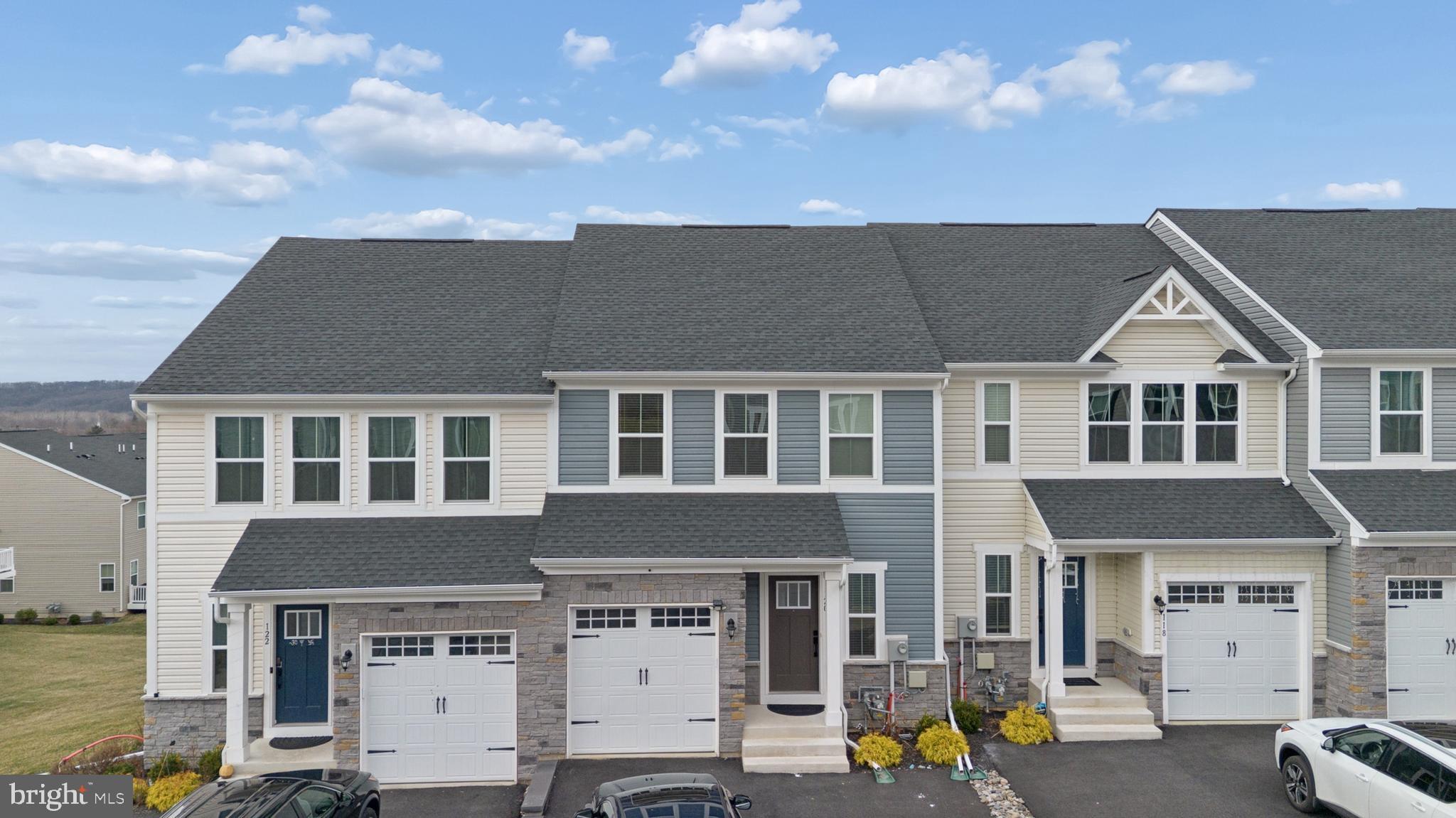 Discover refined living at Highpoint at Downingtown, a vibrant and highly desirable community in Chester County. This beautifully maintained, three-year-old townhome offers 3 bedrooms, 3.5 bathrooms, and modern upgrades designed to enhance comfort and style.
As you enter, you’re welcomed by a bright open-concept layout that creates a seamless flow between living, dining, and kitchen spaces—ideal for both entertaining and everyday life. The gourmet kitchen stands out with  cabinets, granite countertops, stainless steel appliances, and an impressive 8-foot center island that serves as the perfect gathering spot. Luxury vinyl plank flooring extends throughout the main level, adding warmth and durability. From the dining area, sliding glass doors open to a spacious composite deck overlooking , making it a perfect place to relax or entertain. The home is positioned on one of the most desirable lots in the community.Upstairs, you’ll find three generously sized bedrooms, including a luxurious primary suite complete with a walk-in closet and a spa-like ensuite bath featuring a soaking tub, dual vanity, and a spacious walk-in shower. Two additional bedrooms offer ample closet space and share a well-appointed hall bath. A convenient second-floor laundry room with added shelving enhances everyday convenience. The fully finished walkout basement expands the home’s living space and includes a full bathroom, making it perfect for a home office, guest suite, fitness room, or entertainment area. 

Located within the highly regarded Downingtown Area School District, this home is just minutes from shopping, dining, major routes, and commuter options. Enjoy close proximity to Wegmans, Downingtown STEM Academy, and the Downingtown Train Station, with convenient access to Routes 202 and 30.

Only three years young, this exceptional home offers the perfect combination of location, modern luxury, and low-maintenance living—all within a sold-out community. Don’t miss the opportunity to make it yours.