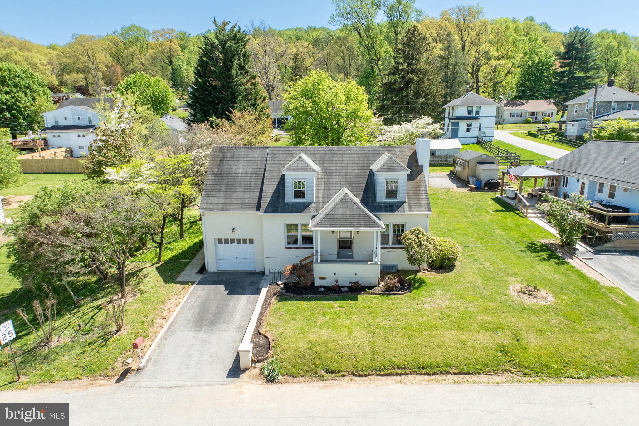 Welcome to 3706 Norwood, a classic Cape Cod home full of charm, character, and sunlight! This 3-bedroom, 1.5-bath gem offers spacious living and a layout designed for comfort and convenience, all just minutes from shopping, dining, schools, and major routes.

Step inside to find a bright and inviting main level featuring a large family room, separate dining room, and a cheerful kitchen with plenty of natural light. A convenient first-floor laundry room and powder room add to the functionality of the space, while the covered front porch welcomes you with timeless curb appeal.

Upstairs, you'll find three generously sized bedrooms, each with multiple closets, ready to suit your needs, whether you need guest rooms, a home office, or additional living space. The unfinished basement provides excellent storage and potential for future finishing.

Outside, enjoy the expansive backyard that spans a double lot, offering endless possibilities for relaxing, entertaining, gardening, or even future expansion. A private driveway and attached one-car garage make parking a breeze. Thoughtfully maintained and full of charm, this home is move-in ready with plenty of potential to add your personal style over time.  

With charming details throughout, abundant natural light, and a location that can't be beat, this lovely home is full of possibilities!