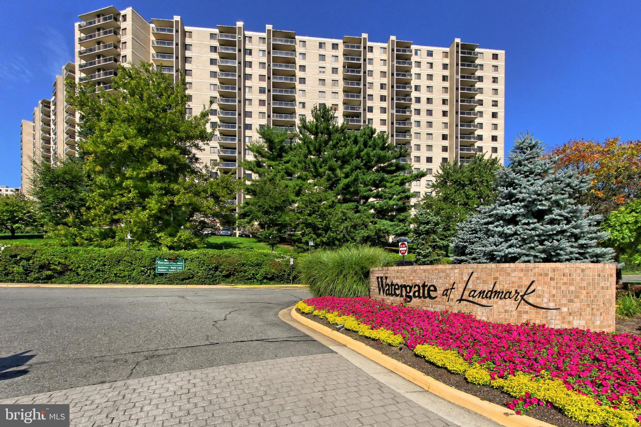 Welcome to Watergate at Landmark, where resort-style living meets urban convenience in this beautifully renovated D Model condo on the 9th floor of centrally located Building 2. This 2-bedroom, 1.5-bath unit offers 1,064 square feet of stylish living space and a spacious balcony that overlooks the lush green space of the 35-acre community. The interior boasts porcelain ceramic tile flooring, freshly smoothed ceilings, and a thoughtfully designed split-bedroom layout for added privacy. The primary bedroom features luxury vinyl plank flooring, a modern barn door with opaque glass panels, an en-suite bath with a dressing area, a walk-in closet, and a second mirrored closet. The second bedroom has a spacious closet, a large additional storage area with opaque glass doors, and shares the same stunning outdoor views. The kitchen is equipped with white maple shaker-style cabinetry, sleek stainless steel appliances including a SMART refrigerator with Family Hub, and connects seamlessly to the dining area which includes recessed lighting, a fireplace wall, and porcelain tile accents. The updated bath features a floating vanity, a luxurious tub/shower combo with tile detailing, a high-end spray shower system, and an LED-lit mirror. Also included is a 5'x5' basement storage unit. The rent includes all utilities—electric, gas, water, sewer, and trash. Residents enjoy access to a wide array of amenities including indoor and outdoor pools, tennis & pickle ball courts, volleyball and basketball courts, a fitness center, game rooms, walking path, gazebos with BBQ areas, an on-site café and market, a hair and nail salon, car wash area and 24/7 gated security with patrol services. A community shuttle provides convenient service to Van Dorn Metro, just two miles away, and a Metrobus stop is located right outside the gate. Located minutes from the Pentagon, National Airport, and Washington, D.C., this vibrant, amenity-rich community offers an unmatched lifestyle. Don’t miss the chance to make this bright, updated condo your new home. All Allegiance Property Management residents are enrolled in the mandatory Resident Benefits Package (RBP) for $55.95/month which includes liability insurance, credit building to help boost the resident’s credit score with timely rent payments, up to $1M Identity Theft Protection, HVAC air filter delivery (for applicable properties), utility concierge service making utility connection and home service setup a breeze during your move-in, resident rewards program, on-demand pest control (optional), and much more! If resident chooses not to have on-demand pest control, the RBP cost will be $40.95. More details upon application.