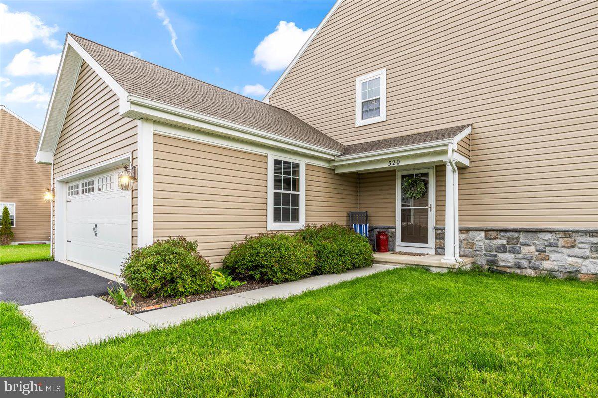 Move right into this beautifully maintained 2019 end-unit townhome offering modern finishes, low-maintenance living, and an ideal location close to everyday conveniences. Featuring 3 bedrooms, 2.5 bathrooms, a finished basement, and an attached 2-car garage, this spacious home combines comfort, functionality, and style in one attractive package.

The bright, open-concept main level is perfect for both everyday living and entertaining, with spacious living and dining areas flowing seamlessly into the upgraded kitchen. Highlights include stainless steel appliances, abundant cabinet space, a large center island, and excellent natural light throughout. A convenient first-floor laundry and mudroom add practical everyday functionality.

Upstairs, recent 2025 updates including fresh paint and new flooring create a clean, modern feel. The spacious primary suite, additional bedrooms, and updated finishes make this home truly move-in ready. The finished lower level provides valuable extra living space with a built-in entertainment bar ideal for movie nights, game days, a home office, gym, or guest space, while still maintaining additional storage space. A water softener and treatment system was also added in 2025.

Enjoy the benefits of end-unit privacy, a private outdoor patio, and affordable ownership with NO HOA fees and NO condo fees. This property offers the freedom of homeownership without additional monthly restrictions or association costs.

Located in a highly desirable and walkable neighborhood, this home is just minutes from parks, shopping, grocery stores, restaurants, healthcare facilities, schools, and major commuter routes, making daily errands and commuting incredibly convenient. Whether you’re searching for a starter home, upgraded townhome, low-maintenance property, or move-in ready home with finished basement and garage, this one checks all the boxes.