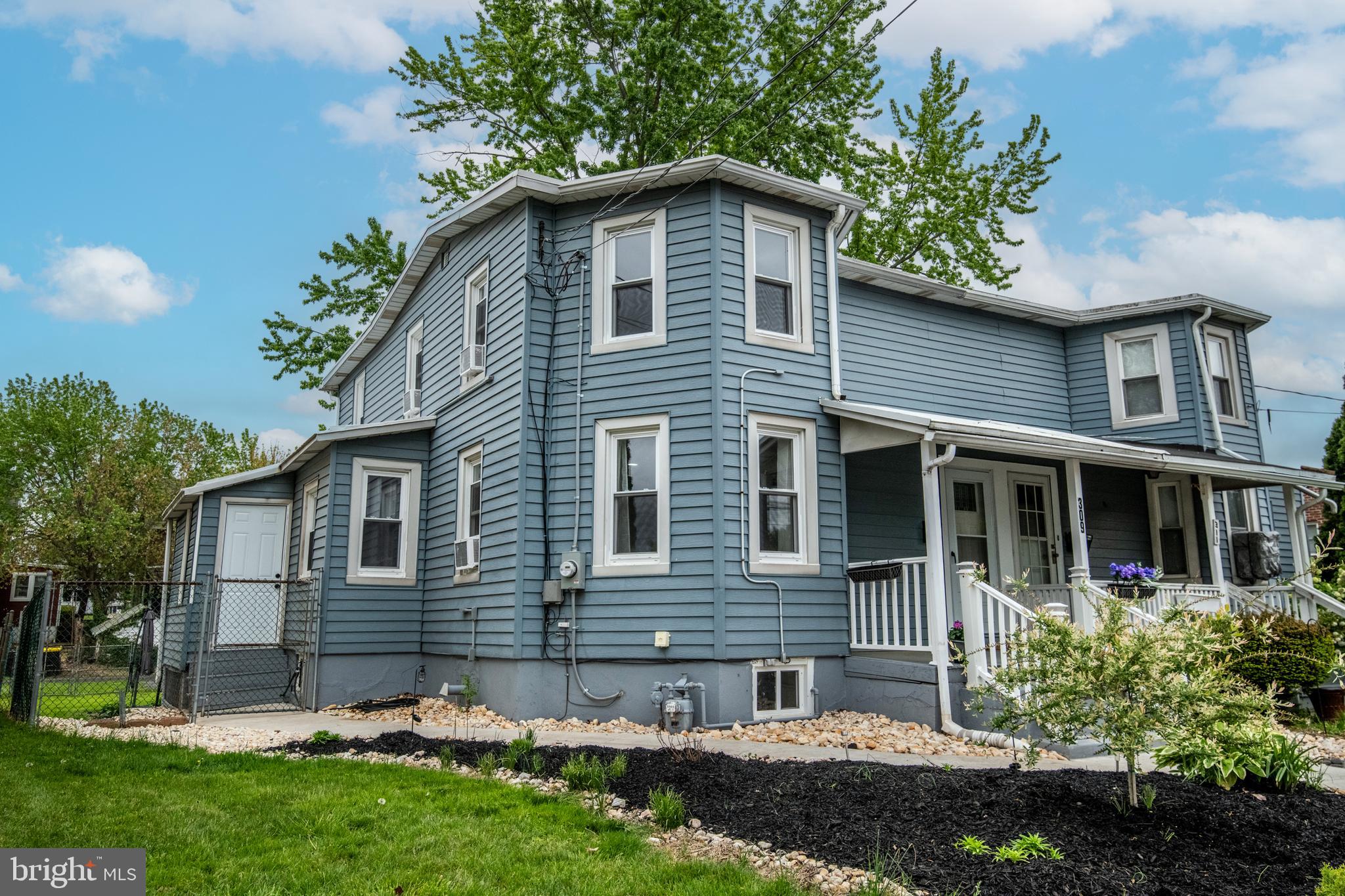 Beautiful 3 bed, 1 full, and 1 half bath twin home in Lansdale. Largely remodeled in 2024/2025, including new kitchen, new bathrooms, total repaint inside. Newer hot water heater, concrete walkways, and roof (2019). The home sits just far enough from the street to have room for your decorative garden each spring. The front porch opens to the massive living room with tons of natural light. The beautiful eat-in kitchen has a new gas stove (2025). Side porch/bonus room and half bath finish off the first floor. Upstairs are 3 bedrooms and a full bath. Primary has 4 windows for ample natural light! The basement has fully waterproofed walls and clean unfinished storage space.  Outback is a fully fenced yard and a huge deck for summer enjoyment and grilling. Rear of property has a 3 car driveway and alley access. Just a short walk to downtown Lansdale. Short walking distance to many great local shops, restaurants, and local transportations. Near major highways, 309, 202, and 476 . One of the best school districts! Schedule now!