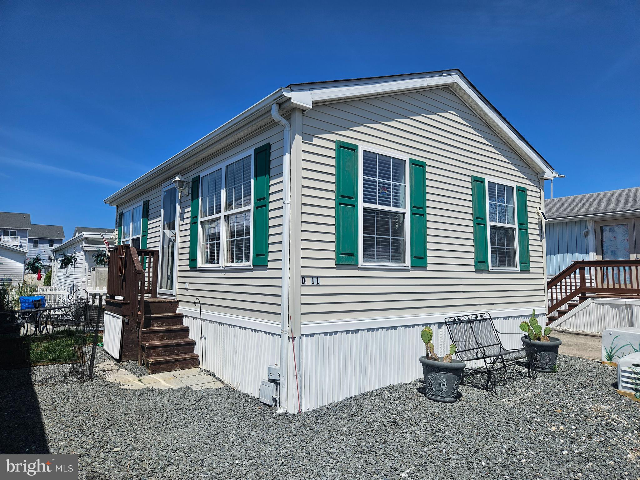 Recently Renovated Home in Downtown Ocean City.  Close to the bay, nestled in Isle of Wight Park. This 504 square foot home with 1  bedrooms and 1 full bathroom are walking distance to the beach, boardwalk, and numerous restaurants and shops. Home is in good condition with 1 dedicated parking space in the driveway. Recent improvements include  New floors and Paint . There is a nice outdoor gravel patio for enjoyment and grilling out in the fair weather months! Please note: Isle of Wight is a Co-Op; shares in the Cooperative are transferred at settlement. This is a must see property it will not last long. The park fee is only $136.75/month and includes Park maintence, water& Sewer, and Trash Pickup.