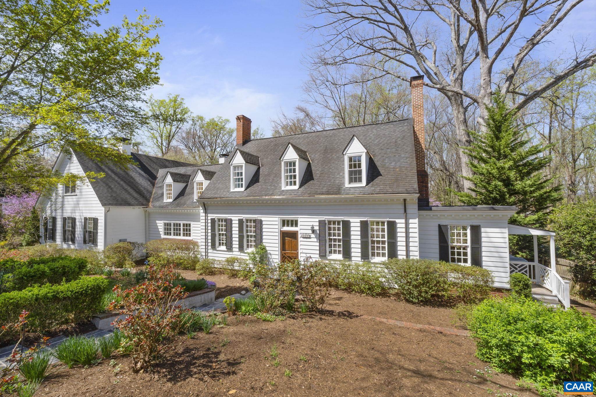 Just listed! This stunning home is nestled on over 1 acre in highly sought-after Meadowbrook Heights!   Mature landscaping and a spacious, wooded lot provide privacy and room for relaxing and entertaining.  Easy walk or bike to UVA and quick access to Downtown, Ivy and Rt 29.  This expansive 6 BR, 4 1/2 Bath stately home exudes classic and traditional warmth and charm.  Tastefully updated, retaining the original character of this 1933 home with 2 fireplaces, an open plan and lots of natural light. Recent improvements inc Subzero refrigerator/freezer and drawer refrigerators, 2 Carrier heat pumps with 7 zones, extensive lighting and plumbing upgrades, full interior and exterior painting, alarm system and 2025 decking and landscaping:see list in Documents--Over $300K in improvements since 2022! Special features inc kitchen designed by Karen Turner, Viking Range, 2" thick oak floors milled from trees on property, Tulikivi soap stone wood stove, radiant floors and Hepa air filtration. The home also features a 1st floor primary BR, private terrace level guest suite, shed and 2 car garage with dog shower. There are 3 addl off street parking spots. This residence combines luxury with comfortable living.  Immaculate and move-in ready!,Fireplace in Family Room,Fireplace in Living Room