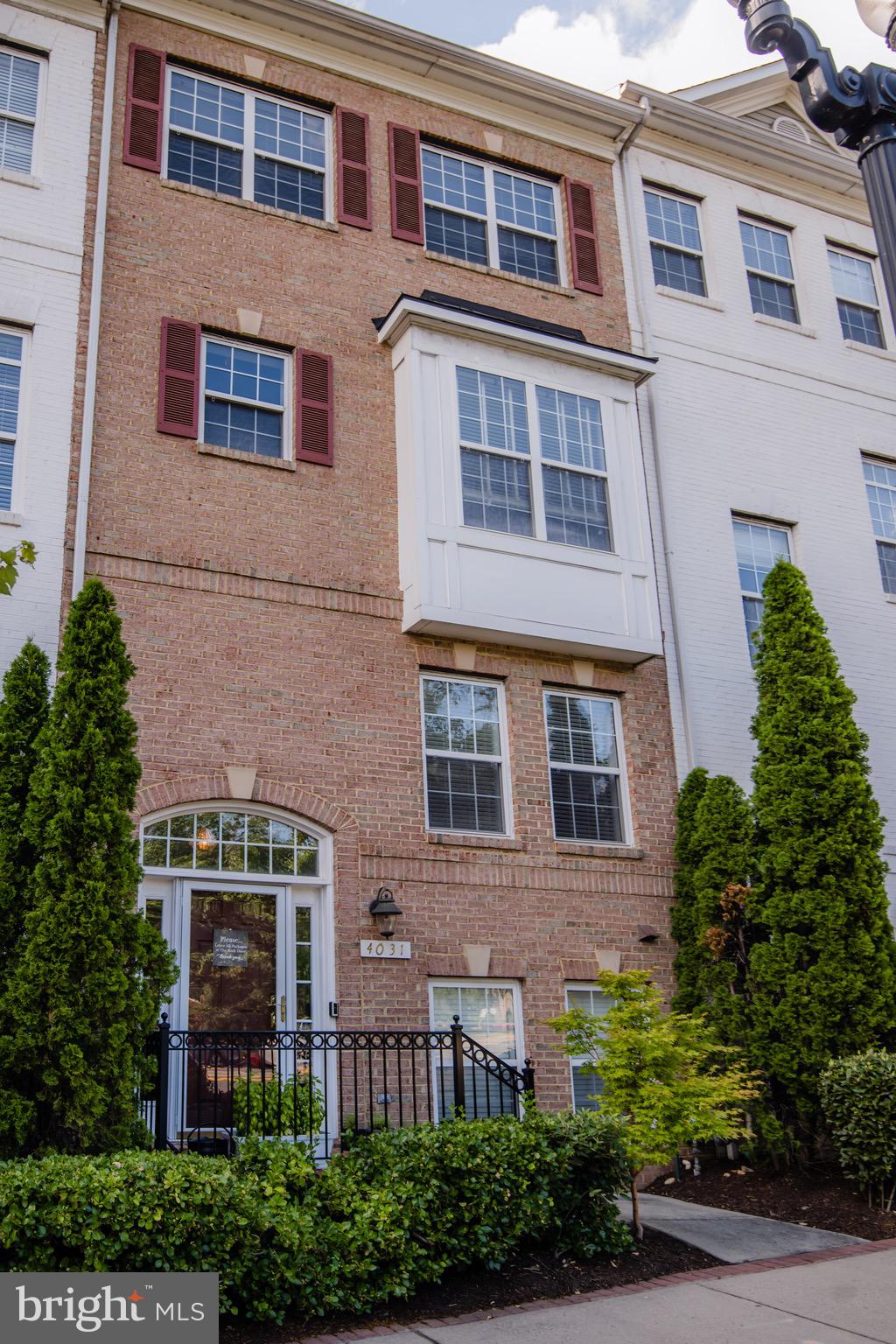 Welcome home to this amazing townhouse in the heart of Arlington. Spacious and light-filled with oversized windows, high ceilings, beautiful hardwood floors, recessed lighting, and crown molding throughout the spacious open concept main level. The main level has gorgeous hardwood floors that flow into a gourmet kitchen with granite counters and a dedicated dining area full of natural light, overlooking a cosy family room with a gas fireplace.  On the upper level, you will find a large master bedroom with a walk-in closet and a private en suite bathroom with his and hers sinks and a shower.  Lower level floor offers plenty of space for an office, craft room or a home gym. Two-car garage with ample storage space is located on the lower level, and the driveway provides room for additional car parking. This home offers tons of improvements, such as, New "Carrier" HVAC system 2020, New Water Heater 2019, New 36" GE black satin stainless steel refrigerator and smart home system throughout.  Amazing location within minutes of everything, steps away from Ballston & Clarendon dining and entertaining, Pentagon & Crystal City, easy access to I-66, I-395 and Route 50.