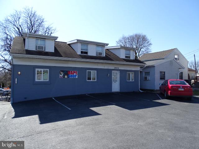 Rare investment opportunity. 2900 Carlisle Road consists of a commercial store front remodeled in 2010, cubicles stay, 1/2 bath, gas heat & CAC. 6+ parking spaces. 2nd floor efficiency apartment comes with stove, refrigerator & hood fan, washer & dryer. Plenty of storage.  2204  Harlacker Lane is a ranch home with 2 bedrooms, 1 full bath, stove, refrigerator & range hood, 3 car off street parking, wraparound deck. Full concrete basement. Please see documents section for utility information, seller's disclosure forms, operating information and tax maps. All units are occupied.