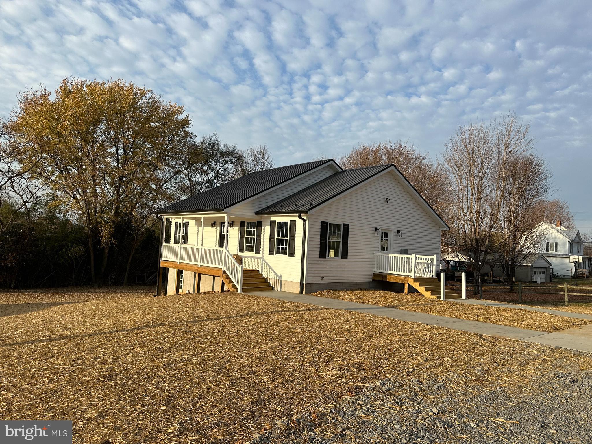 This Brand Quality Built Home is almost complete.  The Main Level of this house features a large Great Room, Kitchen 2 Bedrooms and 2 Baths and the lower level could be used as separate living quarters with it's own separate entrance. Lower Level features Bedroom, Bath, Family Room, Laundry Room and area that is roughed in for a Kitchen if you want to have 2 separate units in the house along with the utility Room.  Beautiful vinyl planking flooring throughout.  Stainless appliances.  Convenient location.  Front Porch and Rear Deck and outbuilding. Tax Info. not available yet.
THIS PROPERTY IS BACK ON THE MARKET AND READY TO MOVE INTO.