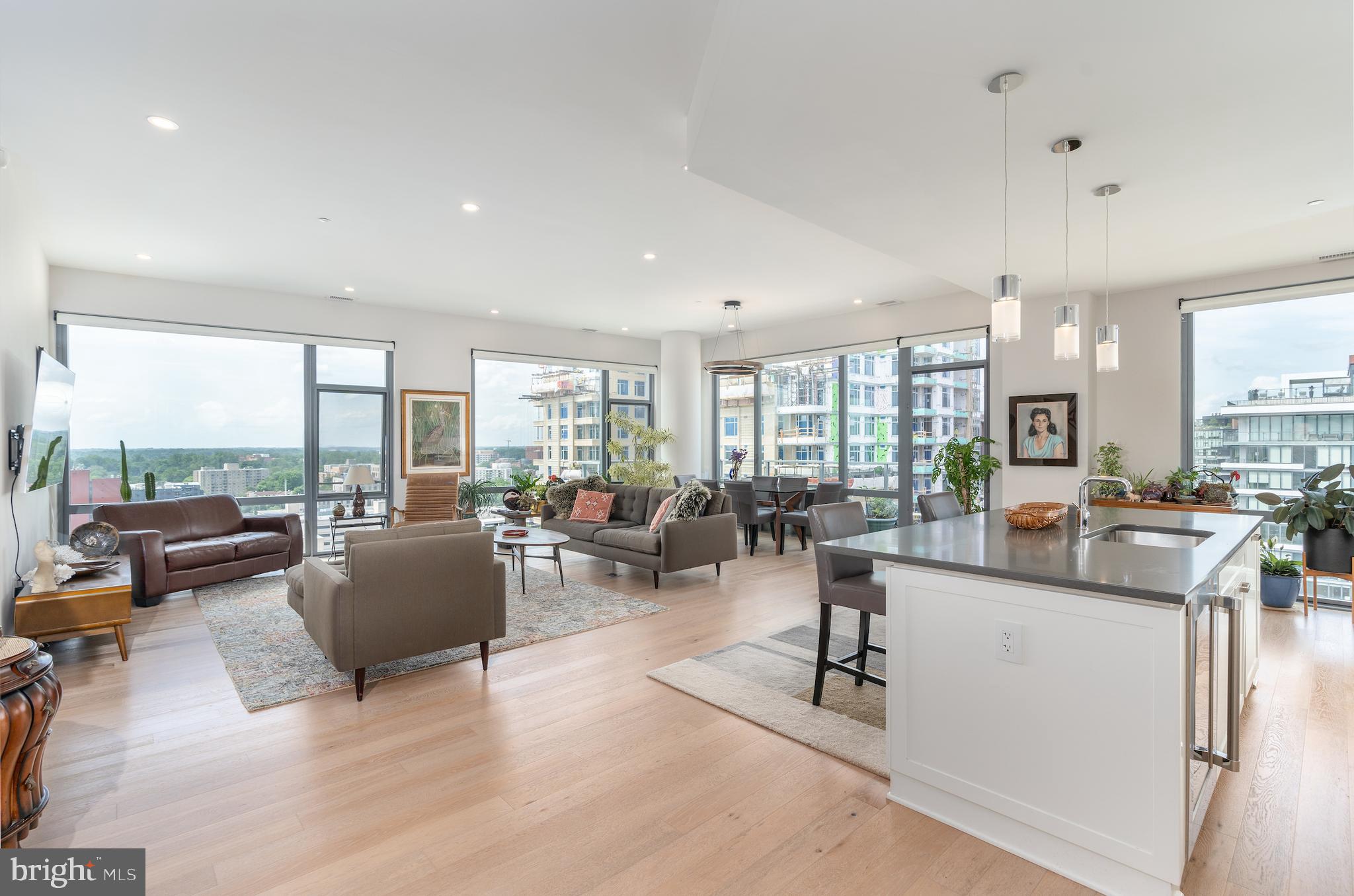 Welcome to your urban oasis in the sky! This meticulously crafted penthouse condo offers the epitome of luxury living with unparalleled amenities and breathtaking views! This 2BR/2.5BA unit features floor to ceiling windows, custom features throughout, open floor plan with ample room for entertaining and two private outdoor spaces. The main level includes two large bedrooms, each with en-suite bathrooms. Primary bedroom features a soaking tub, stall shower, and walk-in closet w/custom built-ins. Second floor includes a den area perfect for a home office or workout space. Large window doors lead to a spacious private roofdeck with sweeping skyline views! This penthouse offering comes with 2 large garage parking spaces +EV charging station, and 2 large storage units. The Cheval offers hotel-like amenities with a 24 hour concierge/front desk, community  room, state of the art fitness center, bike room, and amazing rooftop terrace with multiple seating areas, built-in gas grills and panoramic views.