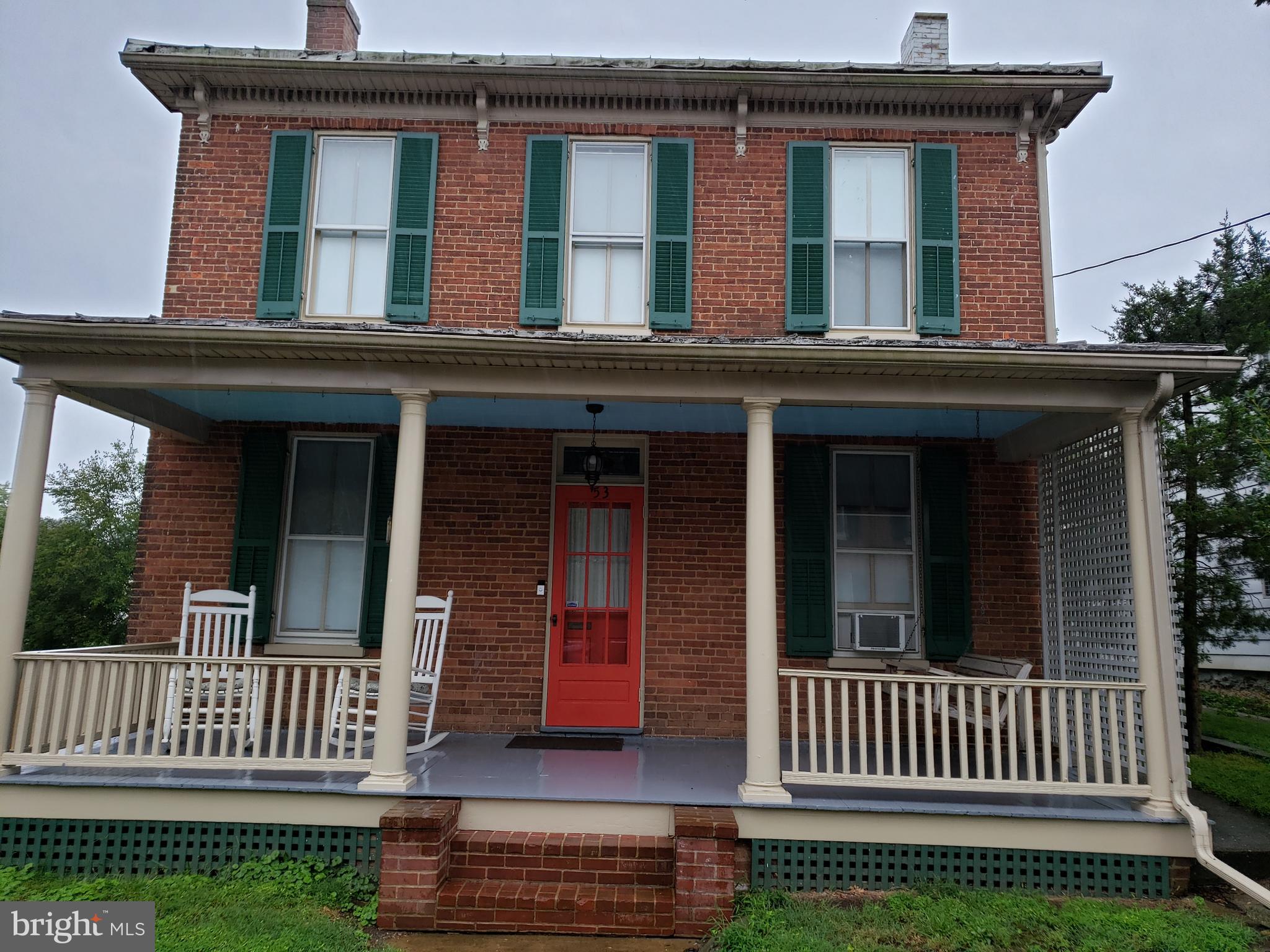 Charming, all brick home with hardwood floors and the original character preserved.  Private back yard with grapevines, mature trees and fully fenced.  Rear deck pre-wired with 220VAC/60A circuit from previous hot tub and includes hot/cold running water.  The garage has been restored to hold one car or all of your gardening needs.  Updated, high-efficiency gas boiler for cozy warm heat. This home offers the extra bonus of a relaxing Sauna! Shows well and has been very well maintained.
