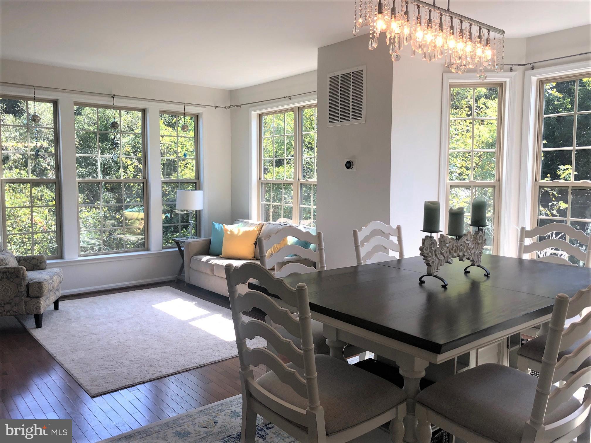 Stylish Living in Historic Occoquan!  This brick front, 3 story, end unit townhouse with 2 car garage offers so many of the upgraded features that you have been looking for.  The main level features hardwood floors, high ceilings and lots of windows with views of nature.  The kichen has granite counter tops, kitchen island, gas cooking, stainless steel appliances, pantry and steps out to the rear deck.  The nook off the kitchen offers a gas fireplace.  The living/ dining room areas are nice and spacious with a convenient powder room.
The upper level offers 3 bedrooms and 2 full baths.  The primary bedroom has a walk-in closet, ceiling fan and full bath with soaking tub & separate shower.  There is good closet space in bedrooms #2 & #3.  The He washer & dryer and efficient tankless gas hot water heater are located on this level.  
Downstairs, there is a cute den/ rec room/ 4th bedroom area with full bath.  This room also has a view of nature and offers a perfect get-away for a home-office.  The 2 car garage with expoxy finished floor is super for the car enthusiast.  There are 2 additional parking spaces in the concrete driveway behind the garage.
No cats. Small dogs less than 40lbs, 2-10 years old with pet reference, pet deposit & pet rent.
Vistas at Occoquan is a small neighborhood of just 8 homes located in the historic old town of Occoquan.  There is visitor parking on site & street parking.  Residents enjoy strolling to the various shops and restaurants and to the waterfront park in Occoquan.