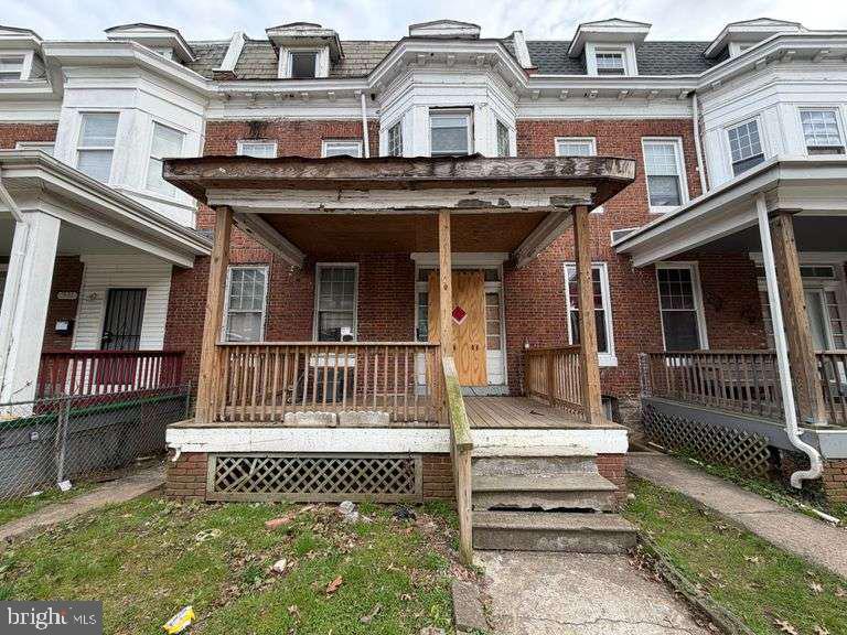 ONLINE AUCTION: This auction takes place on the Ashland Auction Group website bidding platform. Bidding begins 6/1/2026 @ 10:00 AM. Bidding ends 6/3/2026 @12:20 PM. The list price is the suggested opening bid. Deposit: $5,000.

This two-story, porch front townhouse is located in the Dolfield neighborhood of Baltimore city. Residents can enjoy the nearby facilities and attractions such as the Rogers Ave Metro Station and Pimlico Race Track. The property has unknown occupancy. The area provides easy access to major traffic arteries, Garrison Blvd, offering convenient routes to downtown Baltimore and other parts of the metropolitan area.

Demolition for the $400 million redevelopment of Pimlico Race Course began in 2025, marking the start of a major transformation for one of Baltimore’s most historic sports venues. The project, part of the “Pimlico Plus Plan,” will reimagine Pimlico as a year‑round racing and event destination, preserving its legendary heritage while adding modern facilities.