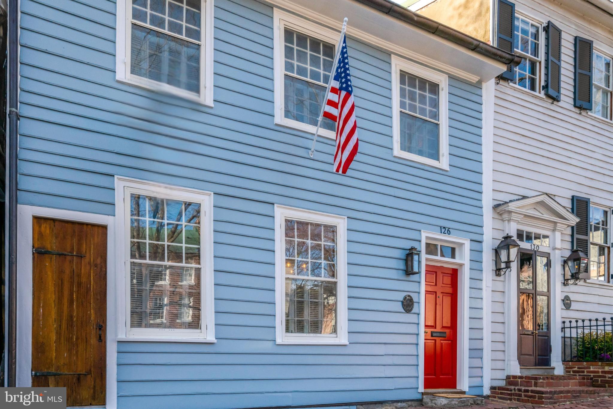 Located on the coveted cobblestones of Captain’s Row in the heart of Old Town Alexandria and built by Colonel Philip Marsteller in 1783, this exceptional historic residence seamlessly blends centuries-old character with modern convenience.  Rich in architectural heritage, the home showcases beautifully preserved details alongside thoughtful updates designed for today’s lifestyle.
Among its rare historic features is the original beehive oven, a remarkable nod to the home’s early history, as well as hand-sewn siding—a distinctive craftsmanship detail found on only a select few homes in Old Town. Inside, timeless elements and light-filled living spaces create an elegant yet comfortable atmosphere for everyday living and entertaining.  The lower and main living levels offer perfect spaces for entertaining, as well as a convenient powder room on each level. On the upper levels, you will find three bedrooms and three full bathrooms, as well as thoughtfully placed storage and modern amenities throughout. 
A rare opportunity to become the next steward of this home and  own a truly special piece of history on one of the most picturesque cobblestone streets in Alexandria.
