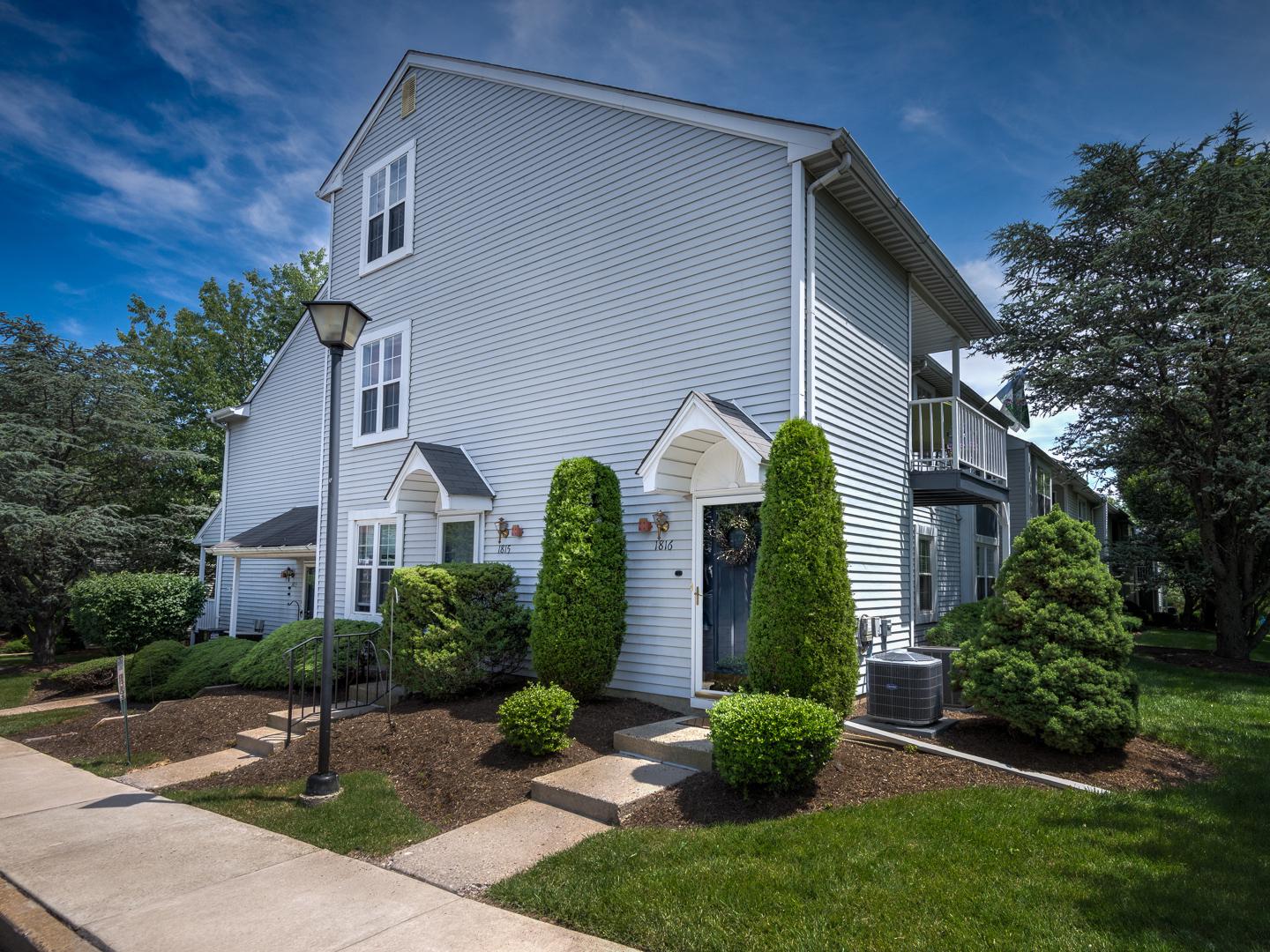 Welcome to Bucks County living at its finest! This beautifully updated, 2nd floor, end-unit condo, located in one of Newtown’s most desirable communities, is truly move-in ready. Step inside to a sun-drenched living room where soaring cathedral ceilings and dramatic skylights create an inviting, airy atmosphere—all enhanced by the professional removal of popcorn ceilings, fresh paint and open architectural interest. The open, seamless flow leads from the living room to the dining room and into a kitchen with a convenient pass-through, making entertaining and meal time a breeze.

This home has been meticulously maintained and thoughtfully improved. The kitchen w/granite countertops was upgraded in January 2026 with a suite of modern GE appliances, including a convection range, sensor microwave, and top-control dishwasher. Further peace of mind is provided by a 40-gallon water heater added (January 2026) and major components replaced in August 2024, including the roof, gutters, skylights, and washer/dryer. Comfort is consistent year-round, thanks to a Carrier heating and air conditioning system (installed 2016, serviced 2026). Throughout the home, you will find refreshed flooring, plush carpeting in the bedrooms, Berber carpeting on the stairs and high-traffic areas, and vinyl flooring in the entryway and a completely renovated bathroom, all improved in 2026.

The flow is as functional as it is comfortable. The main floor features a spacious primary bedroom with a generous walk-in closet and a full bathroom offering dual access from both the hallway and the primary suite. A second bedroom and a dedicated utility room complete the main level. Looking for flexible space? The open third-floor loft overlooking the living area is ideal for a home office, den. Storage is exceptional, featuring a large 12’ x 21’ unfinished attic space adjacent to the loft, plus an additional storage shed off the balcony.

Step outside to your own pleasant, private outdoor space on the balcony. Beyond your door, residents of Newtown Grant enjoy a resort-style lifestyle with amenities that include a clubhouse, swimming, tennis, pickleball, and basketball courts. The association fee covers the heavy lifting, including common area and exterior maintenance, snow removal, and trash service.

Ideally situated for convenience, you are just minutes from the boutique shops and restaurants of Newtown Borough and the outdoor recreation at Tyler Park. Located in the prestigious Blue Ribbon, Council Rock School District, this home offers an effortless commute to Princeton, Philadelphia, and New York. This property is a rare find—schedule a showing today!