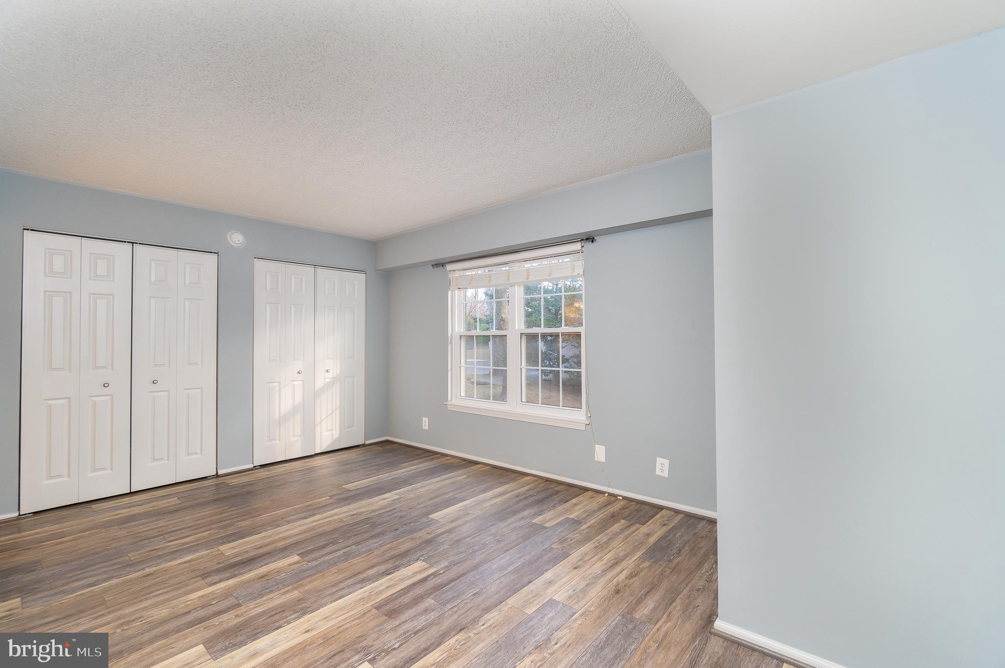 NEW PRICE IMPROVEMENT! Open house  -Sunday 4/20 from 2 pm to 4 pm.  Welcome home! Beautiful and spacious 2 Bedroom and 2 Bath condo in the private gated community of The Colonies.  Corner unit  - 1150 Sq ft.  Freshly painted!  Newer flooring .  Open floor plan.  Large rooms. Newly installed Quartz countertop and new stove. Updated bathrooms and windows in 2018.  A/C  was replaced in  2016.  Washer and Dryer in unit.  Covered one assigned garage parking and plenty of unreserved parking for residents and guests.  Elevator in building.  Extra storage.  24/7 secured entrance.   Wonderful amenities - Outdoor pool, fitness center, fitness trail, tennis courts, club house, pool tables, children's tot lot, picnic areas with grills and much more. Walk  to McLean Metro Station, Capital One Hall, Wegmans, Safeway and Restaurants.  Close to Tysons Corner,  Boro, shops, movie theater, bowling.  Easy access to I-495, I-66, Dulles Toll road and  GW Pkwy.