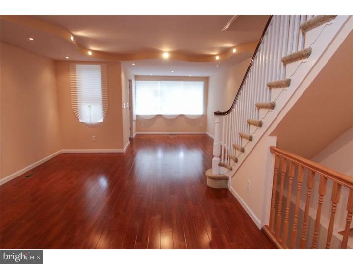 WOW! Look no further, good things come to those who wait! Unbelievable West Oak Lane Home Completely Knocked Out, ready for you to move into! Do you like elegance? Well this home is one of a kind and offers every extra a buyer can want. The entire home has new windows, a new roof w/ warranty, all new siding, updated electric & plumbing, and not to mention all new efficient Heating & AC Units! The 1st floor features a huge open layout with Cherry floors, and a unique trey ceiling combo with recessed lighting, a new kitchen, which features ALL new stainless steel appliances and a nice sized walk-out deck. The upstairs features 3 good sized rooms, and a state of the art spa bath with a Jacuzzi. Other key features include a completely tiled powder room on the 1st floor and a full finished walk-out basement with another newly tiled powder room for your convenience. This home truly has it all and is a MUST SEE!