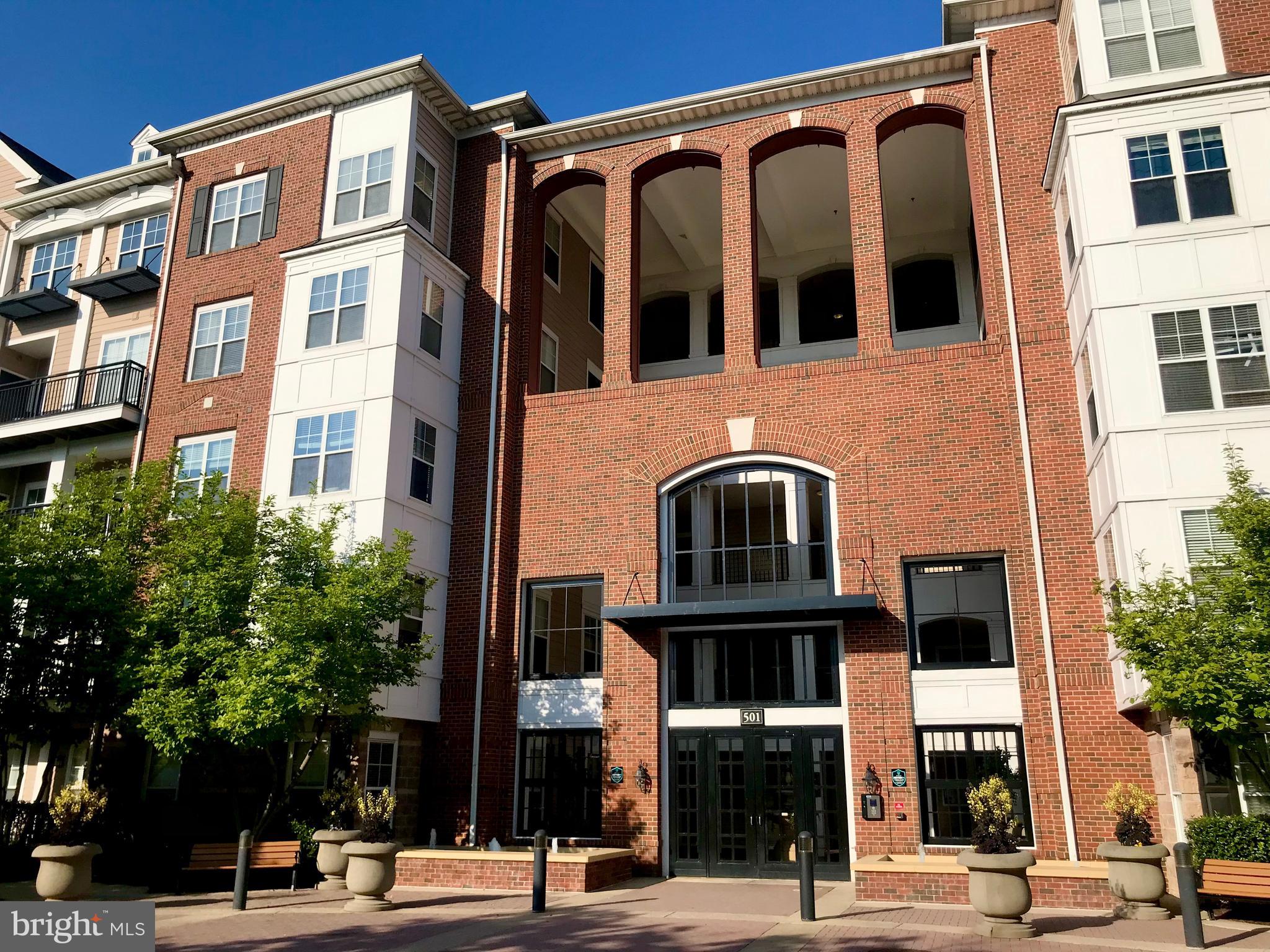 "Bright and beautiful top-floor unit (877 sq. ft.) featuring one bedroom and one bathroom in the highly sought-after Fitz at Rockville Town Center Condominium. This stunning home boasts fresh new paint and LVP flooring throughout. The open-concept layout includes a spacious living room with a cozy fireplace, a gourmet kitchen, and a dining area. The generously sized bedroom offers a walk-in closet, while the in-unit washer and dryer add convenience. A reserved parking space (No. 280) is included. The condo fee covers internet and cable TV. Residents enjoy premium amenities, including a cinema room, gym, courtyard, and outdoor pool. Located within walking distance of Rockville Town Center, the Red Line Metro (Rockville Station), major grocery stores, diverse restaurants, a movie theater, and entertainment options.