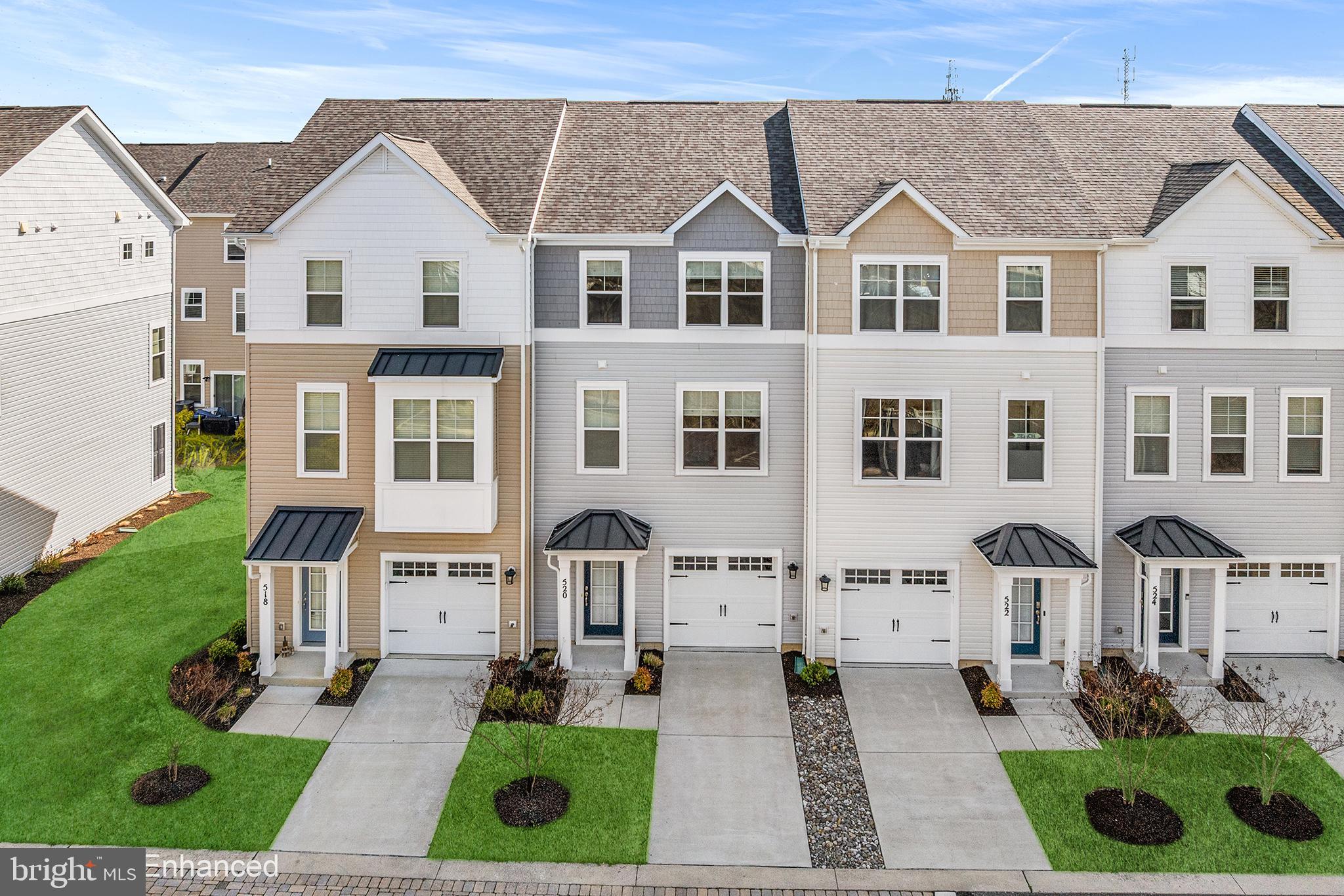 Welcome to this beautiful townhome in the gated community of Deep Harbour, showcasing breathtaking Cambridge Creek water views. Built in 2022, this meticulously maintained 1,796 sq ft, 3-bedroom, 2.5-bath home has been upgraded throughout and offers a perfect blend of comfort, style, and waterfront living. Beautiful flooring flows throughout the home, creating a cohesive and inviting feel, while the Deep Harbour Riverwalk is just outside your door—ideal for waterfront strolls surrounded by wildlife. The entry level offers a versatile finished recreation room with direct access to a paver patio, creating a seamless indoor-outdoor connection for relaxing or entertaining, along with access to the attached one-car garage. The main level is designed to impress, featuring high ceilings and tall windows that fill the space with abundant natural light while framing the stunning water views. The upgraded kitchen includes a large center island with seating for bar stools, granite countertops, hardwood flooring, and upgraded cabinetry. The dining area is ideally positioned on the waterside of the home, allowing you to take in scenic creek views while dining, and flows seamlessly into the spacious great room—perfect for both everyday living and entertaining. Upstairs, retreat to a generously sized primary suite along with well-proportioned secondary bedrooms, many offering peaceful water views of Cambridge Creek. The upper level provides both comfort and functionality with thoughtfully designed living spaces. Additional upgrades include newer ceiling fans, three pendant lights, dimmer switches throughout, window coverings on all windows, and upgraded carpet padding. Two mounted TVs also convey. Deep Harbour is a gated, amenity-rich waterfront community featuring a clubhouse, pool, bathhouse, marina, and scenic Riverwalk trails. Sidewalks throughout the neighborhood enhance the community feel, all ideally located in the heart of Cambridge with convenient access to Route 50, downtown shops, restaurants, and local attractions. Whether you’re seeking a full-time residence or a low-maintenance waterfront retreat, this home offers the best of Eastern Shore living in a truly special setting.  Mortgage savings may be available for buyers of this listing.