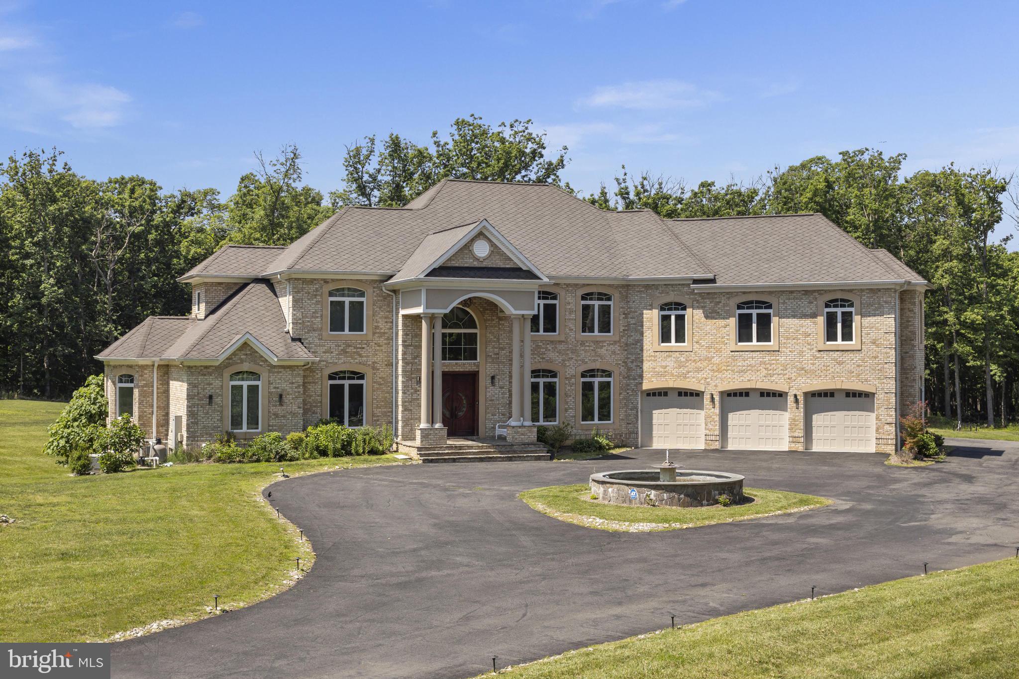 Minutes to I-66 & all major highways yet tucked at the end of a private, discreet street, this stately gated estate offers exceptional luxury and privacy. Built in 2016, the approximately 9,000-square-foot home sits on five pristine acres. High-end finishes define expansive interiors, with an elevator providing effortless access to all levels. Designed for both entertaining and relaxation, the home includes a private movie theater with surround sound, a sauna, and a fully equipped gym. A full-house generator ensures comfort and peace of mind, completing this elegant and exclusive retreat.