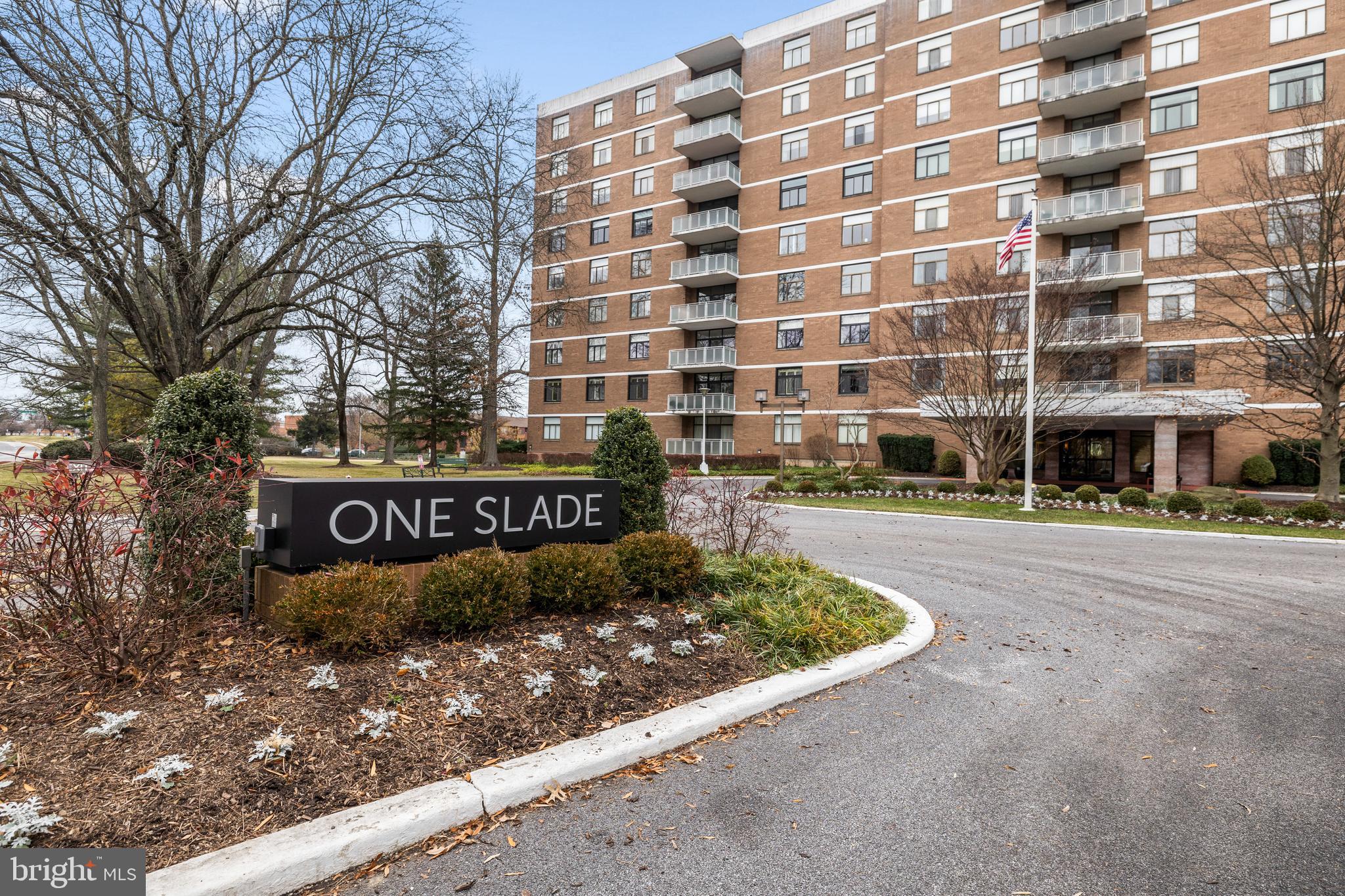 **Sellers are offering $15,000 credit at settlement to offset first year of condo fees** This expansive 2 bedroom, 2.5 bath condo makes a down-size or 1-level living transition a breeze! Entry into the formal foyer is illuminated by an elegant drum chandelier and offers jacket space for every season in the oversized double coat closet. The spacious living/dining room combination will easily host your full formal dining set with a living area that can accommodate 2 distinct seating arrangements. The bright and cheerful eat-in kitchen has abundant cabinetry, handsome bullnosed granite counters, a stainless steel LG French door fridge, double wall ovens and plenty of room for your kitchen table. The second bedroom functioned as a den and offers a convenient wall-to-wall built-in storage/display unit while the primary bedroom presents classic floor-to-ceiling built-ins framing the bed niche, a built-in chest of drawers unit plus walk-in and linen closets. Storage is definitely not a challenge in this unit with loads of closet space, great built-ins and a huge storage room.  Enjoy the full services provided by this building including concierge & package services, doorman & 24-hour security. 1 garage plus 1 surface lot parking spaces conveyed with sale.
