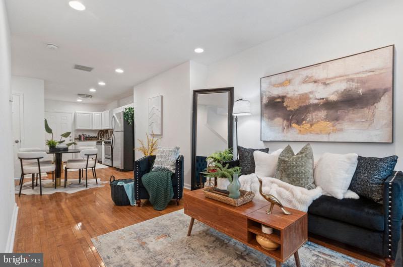 This Home is a Block from Hopkins!  Very convenient location.  Private back yard fully fenced in.  Always plenty of street parking along with a church parking lot next door.  Wood floors are beautiful, carpet is brand new, freshly painted, ready for you to move right in.