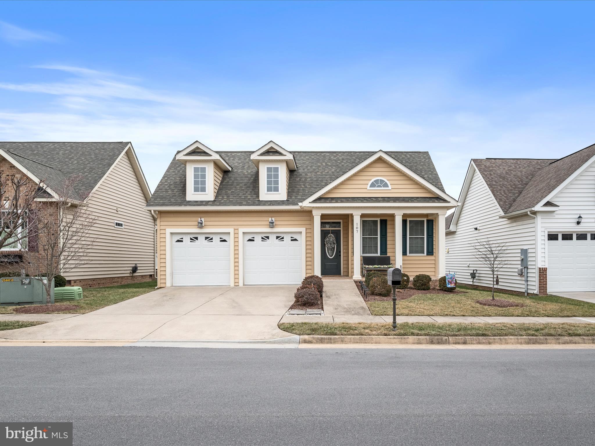 Welcome to Cedar Meadows, a premier 55+ community! This charming 2-bedroom, 2-bathroom home is designed for effortless living and maximum comfort with lots of privacy with the split floor plan design.

Step inside to find gleaming wood floors that lead into a spacious living room, where cathedral ceilings and a cozy natural gas fireplace create a warm and inviting atmosphere. The light-filled kitchen boasts ample cabinetry and workspace, perfect for all your culinary needs.

The primary suite features a generous walk-in closet and a private full bath, while the guest bedroom and additional bath provide a welcoming retreat for visitors.

Enjoy the outdoors on the delightful brick side porch—ideal for morning coffee or evening relaxation—or unwind on the covered front porch.   A two-car garage ensures easy parking and extra storage.

Cedar Meadows offers wonderful amenities, including a clubhouse, walking trails, and sidewalks. Plus, the HOA takes care of snow removal, lawn maintenance, and trash service, allowing you to enjoy a truly low-maintenance lifestyle.

Don't miss this opportunity to embrace comfort and convenience in a vibrant 55+ community!