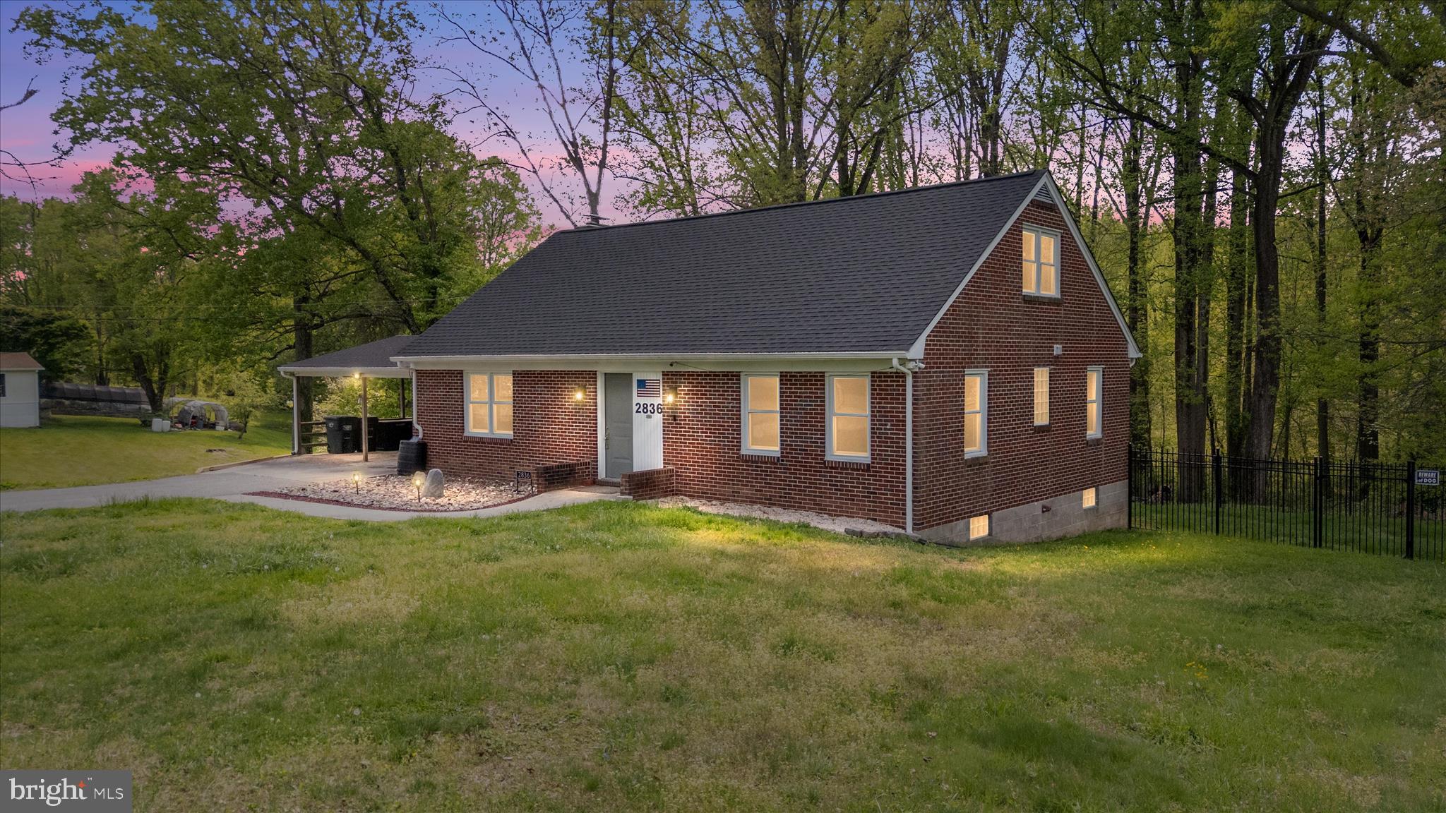 Fully Renovated & Move-In Ready Cape Cod on 1.6 Private Acres 
Welcome home to the perfect blend of luxury and privacy. Situated on 1.6 acres with no HOA, this beautifully renovated four-bedroom brick Cape Cod offers a rare retreat from the everyday hustle. It features a new roof, new quartz countertops, updated bathrooms, and gleaming hardwood floors throughout. The large eat-in kitchen opens to a formal dining room, anchored by a wood-burning stove. The main level features two bedrooms and a full bathroom; upstairs has two large bedrooms, both with full headroom, and a second full bath. Step outside to the screened porch to relax and enjoy the fenced-in lawn. Beyond the fence, you'll find a cleared area with a firepit that leads into thick, beautiful woods winding to a creek. The full basement offers ample storage space and includes a bathroom rough-in. Complete with a two-car carport, this home is the perfect blend of serene location and premium craftsmanship throughout. Schedule your showing today!