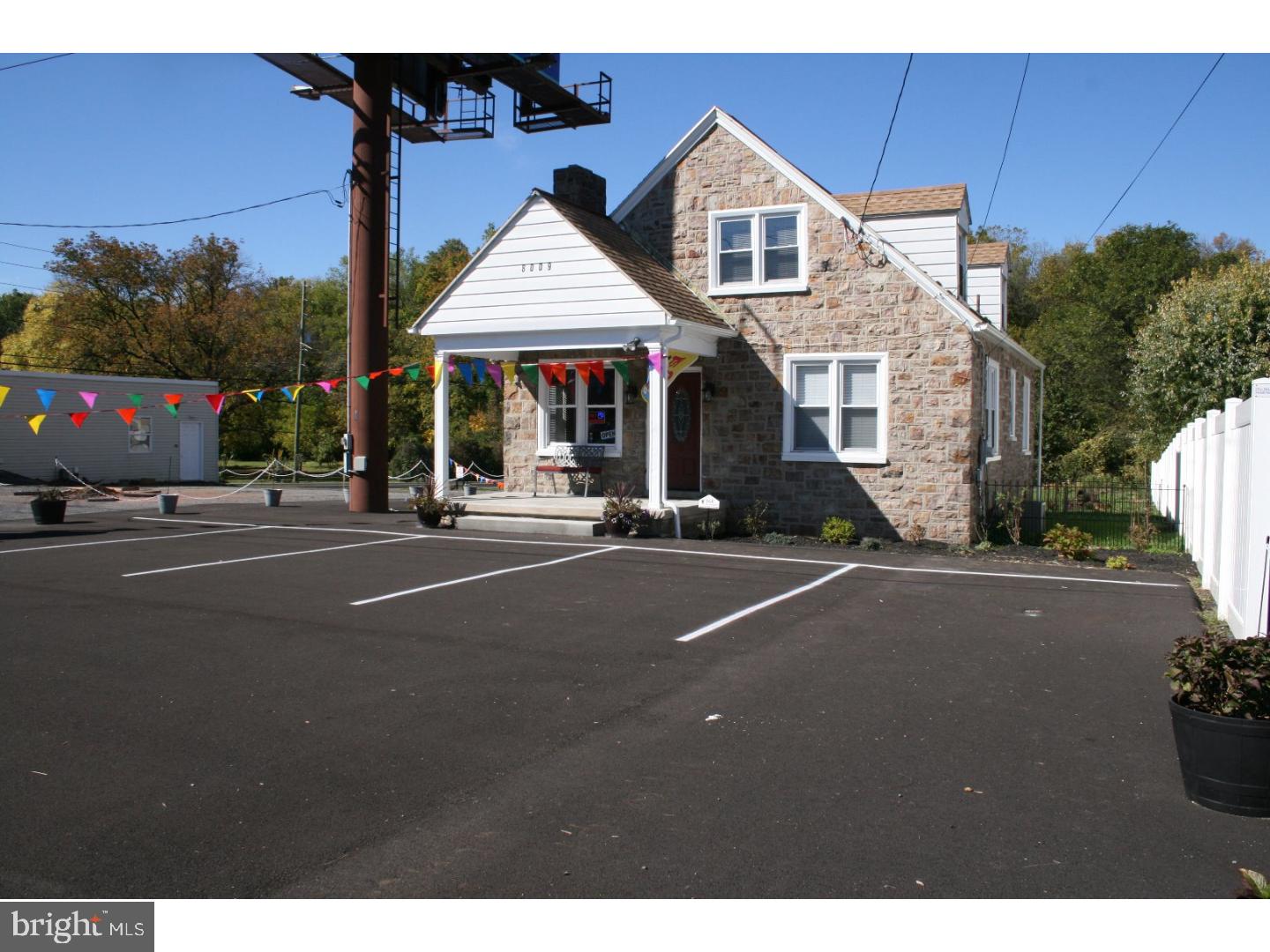 This beautiful stone building was being used as a dog grooming  business but has many possibilities.  It has 4 large rooms and a restroom on the first floor and 2 large rooms on the second floor. The location has high visibility because it is near the intersection of Route 222 and Dries Road. Traffic volume of 29,000 vehicles per day.  This is a great place to put your small business or office and has plenty of parking to accommodate it.  Property has a macadam parking lot on Route 222 and another parking lot coming off of Dries road. The property sits on .56 acres and was remodeled in 2014. New AC, new 160 foot well, new macadam , new alarm system, new camera system and more.