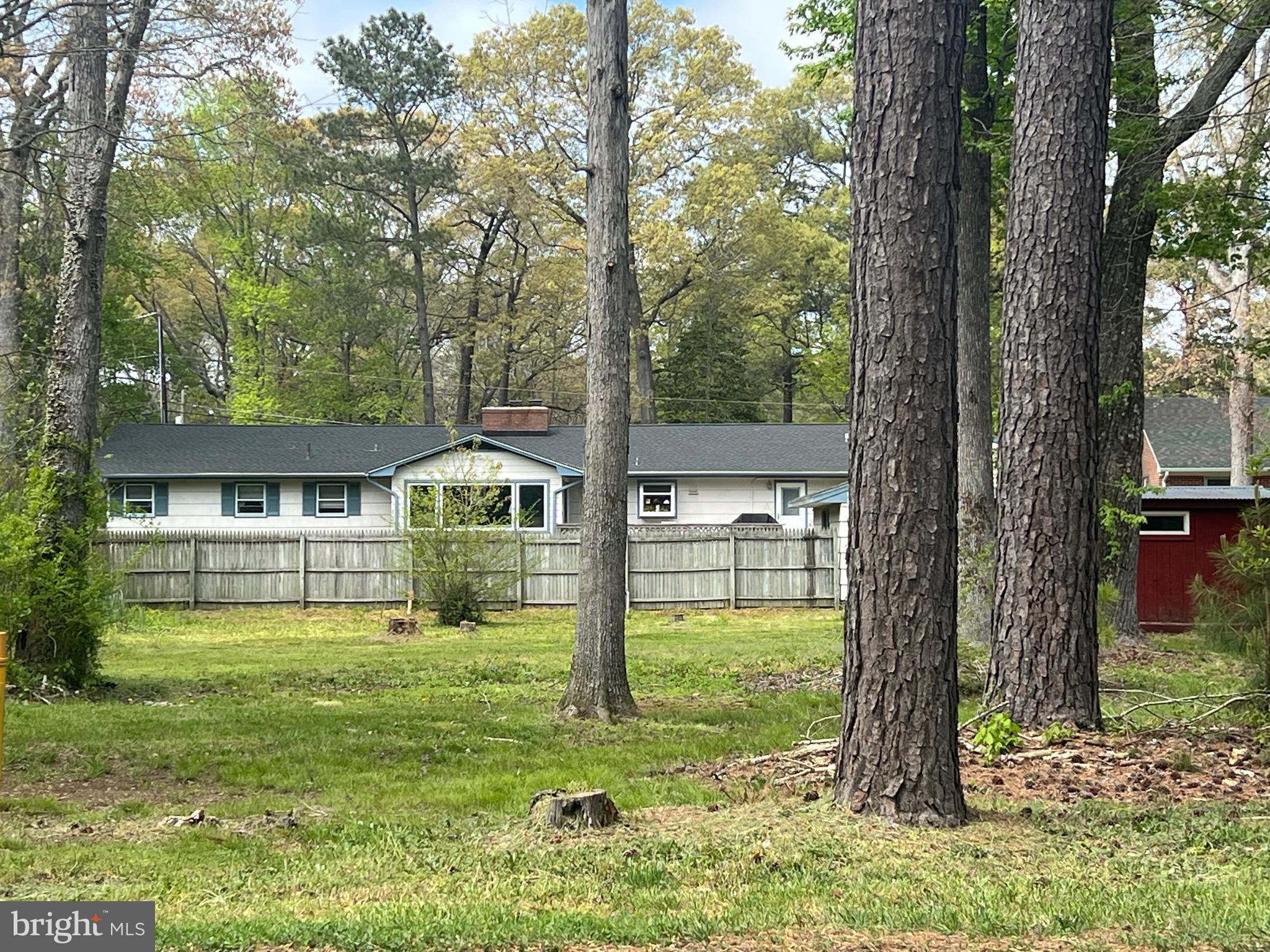 vacant buildable lot in a platted subdivision 
there is a red shed on the property