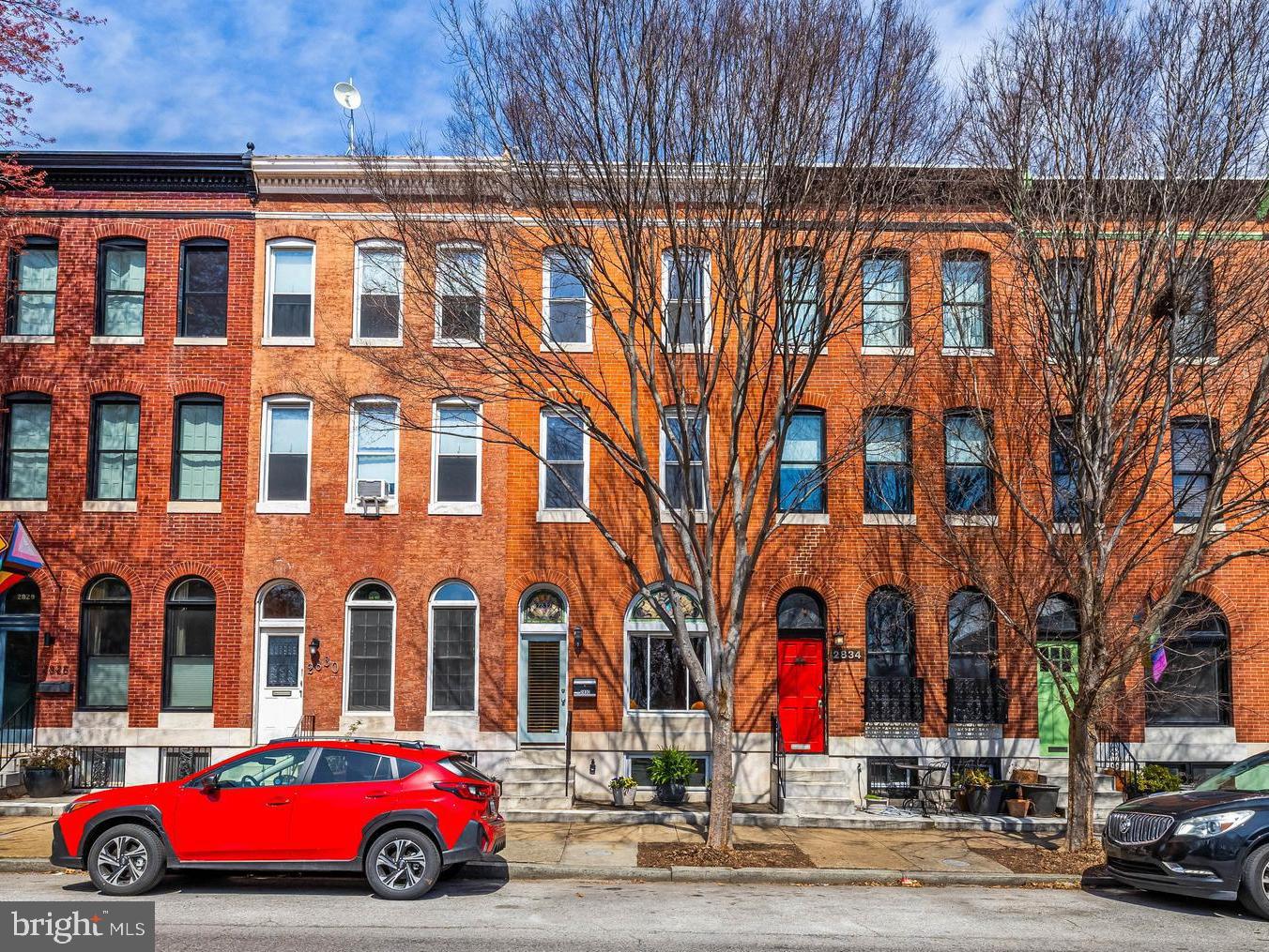 **Offer Deadline of Saturday, April 5th at 7pm - Please bring best and final offers.  Seller reserves the right to accept an offer in advance of the deadline**  Welcome to 2832 East Baltimore Street in the beautiful Patterson Park neighborhood! This massive park-front townhome features 4 bedrooms and 2.5 bathrooms. The gorgeous stained-glass windows, built-in bookcase, and stunning staircase provide a glimpse back into the history of this 100+-year-old residence. Tall ceilings and original hardwood floors highlight the expansive open floor plan of the main level. The large kitchen provides ample storage and counter space. A private fenced patio is located off the kitchen and is ideal for entertaining. The second level is comprised of three bedrooms and one centrally located hall bathroom, while the third level is home to the primary bedroom suite. The spacious primary bedroom offers views of Patterson Park and includes a walk-in closet and an attached bathroom. The lower level of this home is partially finished and could be an excellent family room or home office. A workshop and an abundant amount of storage are available in the unfinished portion of the basement. While being sold as-is, this home has been well maintained.  Take advantage of the easy access to Patterson Park, a 137-acre amenity-filled urban oasis with open fields of grass, large trees, paved walkways, a lake, playgrounds, athletic fields, a swimming pool, an ice-skating rink, and a dog park. Convenient location near Johns Hopkins Hospital, Downtown, restaurants, and shopping.