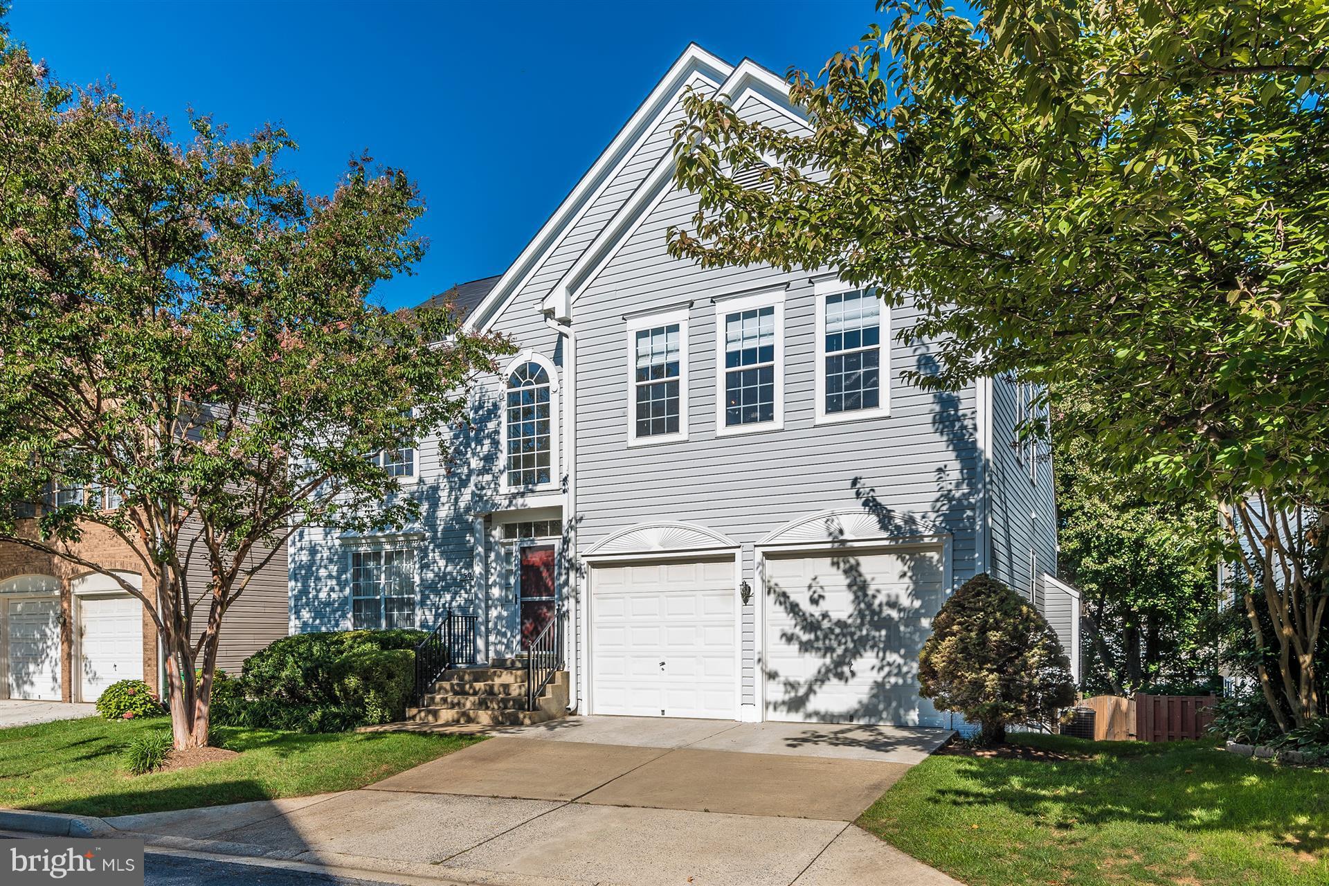 LOCATION & BEAUTY!!! Home w/all the bells and whistles. Granite counter tops, stainless steel appliances, crown molding, chair rail, recessed lighting, marble floor, marble counter tops, jacuzzi tub, separate shower, 2 linen closets, 2 large storage areas, 1 small storage area, extra freezer & refrigerator, finished walk-out basement with full size bedroom & full bath. Two tier deck. Fenced yard.