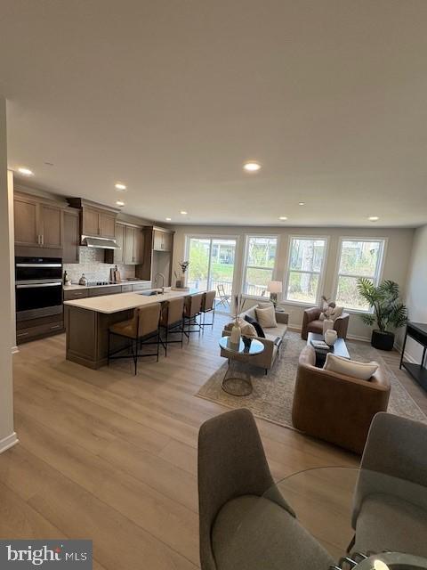 You'll feel right at home in the Brentford, beginning with an inviting foyer that opens to a spacious flex room and offers views into the expansive great room with rear yard access. The well-designed kitchen is highlighted by a large center island with breakfast bar, ample counter and cabinet space, and a sizable pantry. The elegant primary bedroom suite features dual walk-in closets and a beautiful primary bath with a dual-sink vanity, luxe shower, and private water closet. Secondary bedrooms offer generous closet space and share a hall bath with a dual-sink vanity and linen storage. Additional highlights include a convenient powder room, everyday entry, centrally located laundry, and abundant storage throughout. A finished basement provides valuable additional living and entertainment space, perfect for hosting guests, creating a home office, fitness area, or media room. Available for a Winter 2026 move-in, this beautifully designed home offers the ideal combination of luxury, functionality, and everyday comfort.