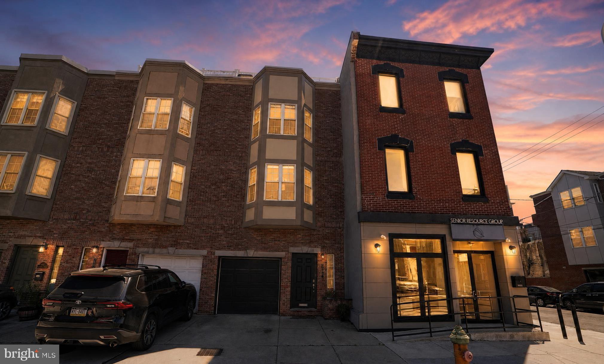 Welcome to 2246 Christian Street, an exceptional 18-foot-wide home in the heart of Graduate Hospital offering space, convenience, and rare city living. With four bedrooms plus a finished basement with egress offering potential for a fifth bedroom, 2.5 baths, multiple outdoor living spaces, high ceilings throughout, and parking for up to three vehicles, this home checks every box.
A welcoming foyer with coat closet and direct garage access opens to a bright, open main level featuring hardwood floors, high ceilings, and a wall of south-facing windows. The open layout connects the living, dining, and kitchen areas for easy everyday living and entertaining. A convenient powder room is located just off the kitchen.
The kitchen features granite countertops, stainless steel appliances, abundant cabinetry, an updated backsplash, under-cabinet lighting, and a large center island. The rear outdoor space extends off the main level, perfect for grilling, dining, and relaxing.
This home features abundant closet space, excellent storage throughout, and well-defined spaces that offer flexibility for everyday living.
The second floor offers three spacious bedrooms, a full hall bath, and an oversized laundry room. The finished lower level with egress provides flexible space for a media room, gym, office, playroom, or potential fifth bedroom suite.
The entire third floor is a primary suite retreat with high ceilings, a generous walk-in closet, and an en-suite bath with a double vanity and oversized walk-in tiled shower.
The bi-level Trex roof deck is a standout feature with unobstructed panoramic skyline views, solar lighting, water access, a newer pergola, and a dedicated landing area ideal for a future wet bar, creating seamless indoor-outdoor entertaining.
Major upgrades include stucco remediation with replacement using Hardie board siding to the front bay windows, roof replacement, Trex rooftop deck construction, dual-zone HVAC, tankless water heater, EV charging with 240V service, updated garage door system, and kitchen improvements.
Located in Graduate Hospital, enjoy walkable access to parks, playgrounds, dining, cafes, groceries, the Schuylkill River Trail, Penn, CHOP, Center City, and major highways.
A rare opportunity combining space, parking, outdoor living, and location in one of Philadelphia’s most desirable neighborhoods.