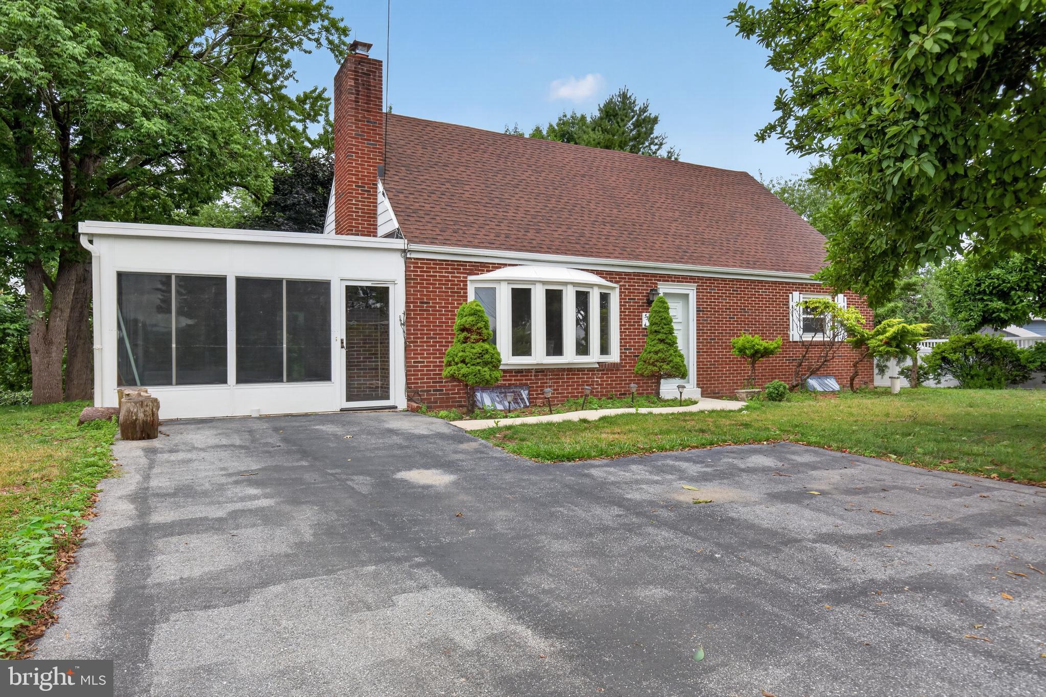 This charming 1958 ranch  home offers a spacious layout with 4 bedrooms and 2 full bathrooms. roof was installed in 2024 and the outside A/c unit was replaced in 2025.Bring your personal touches to this home in Lower paxton TWP with hardwood floors, partially finished lower level. The main level living room features a bay window bringing in lots of natural lights. Open dinning area and spacious kitchen. There is the cinvenience of having two vedrooms, one full bath on main level and two add bedrooms , one full bathroom on the 2nd level. wood burning fire place on the lower level also has family room. 24x26 spacious sunroom allows for a great space . Located on quiet street- conveniently located 10 mins to Hershey and Harrisburg downtown.