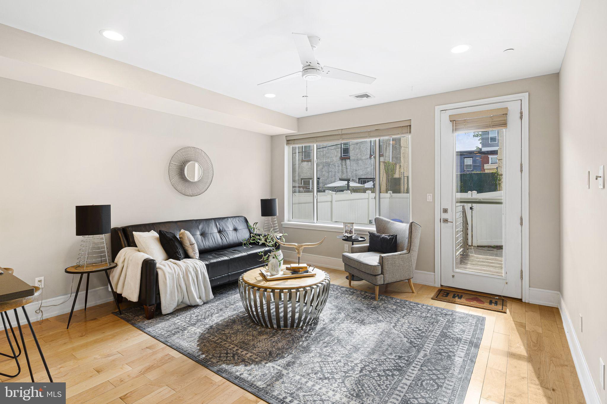 Built in 2017, this modern condo offers the ideal blend of space, style, and low-maintenance city living in one of Philadelphia’s most desirable residential neighborhoods, just minutes from Center City. With 1,466 square feet, 3 bedrooms, and 2.5 baths, the home combines a smart, flexible layout with clean contemporary finishes throughout.

Inside, the open-concept living area features wide-plank hardwood floors, recessed lighting, and oversized windows that fill the space with natural light. The sleek kitchen is equally functional and inviting, with modern cabinetry, stainless steel appliances, gas cooking, and generous prep space designed for both everyday living and entertaining.

The thoughtfully designed floor plan offers flexibility for a variety of lifestyles, whether you need a dedicated home office, guest space, fitness room, or creative studio. Contemporary bathrooms include a spa-inspired glass shower with designer tilework, while the additional powder room adds everyday convenience for both residents and guests.

Set in a vibrant, walkable neighborhood with easy access to parks, dining, shopping, and major commuter routes, this move-in ready home offers a comfortable and convenient home base in the heart of Philadelphia.