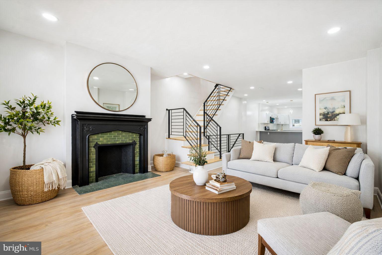 Welcome to 5831 Washington Avenue, ideally situated in the Cobbs Creek section of Philadelphia. This beautifully renovated residence is set along a picturesque, tree-lined block and offers exceptional access to University City and Center City Philadelphia, making it a convenient location for work, dining, and entertainment. The home is also located near Cobbs Creek Park and just minutes from the shops and local eateries along Baltimore Avenue. As you approach the property, you are welcomed by a classic concrete front porch—an inviting space for outdoor lounging and everyday relaxation. Inside, the home features a thoughtfully designed interior with durable flooring, high ceilings, recessed lighting, and a seamless open-concept layout that flows effortlessly into the newly renovated kitchen. The kitchen is appointed with soft-close cabinetry and an elegant gold-and-white accented backsplash, creating a refined and modern aesthetic. Direct access from the kitchen leads to the rear outdoor space, where a newly constructed deck extends the living area and provides additional space for entertaining or relaxation. The fully finished walk-out basement adds exceptional versatility, featuring a newly updated full bathroom and porcelain tile flooring well-suited for the space. Recessed lighting enhances the bright, polished feel, while the layout allows for a family room, media area, or entertaining space. A separate rear room offers flexibility for a home office, fitness area, or additional private use. The laundry area is also conveniently located on this level.
The second floor continues the cohesive design with consistent vinyl flooring throughout and includes four spacious bedrooms, each featuring recessed lighting. The primary bedroom offers high ceilings, an exposed brick accent, generous closet space, and abundant natural light. A hall linen closet provides added storage, while the full hallway bathroom is well-sized and tastefully finished. The three additional bedrooms each offer unique character and flexibility to suit a variety of needs. This home presents a well-balanced blend of modern upgrades, functional design, and an accessible location—offering a turnkey opportunity in a well-established Philadelphia neighborhood.
This home comes with a one -year home warranty. All Closing Cost Assistance Programs are welcome.