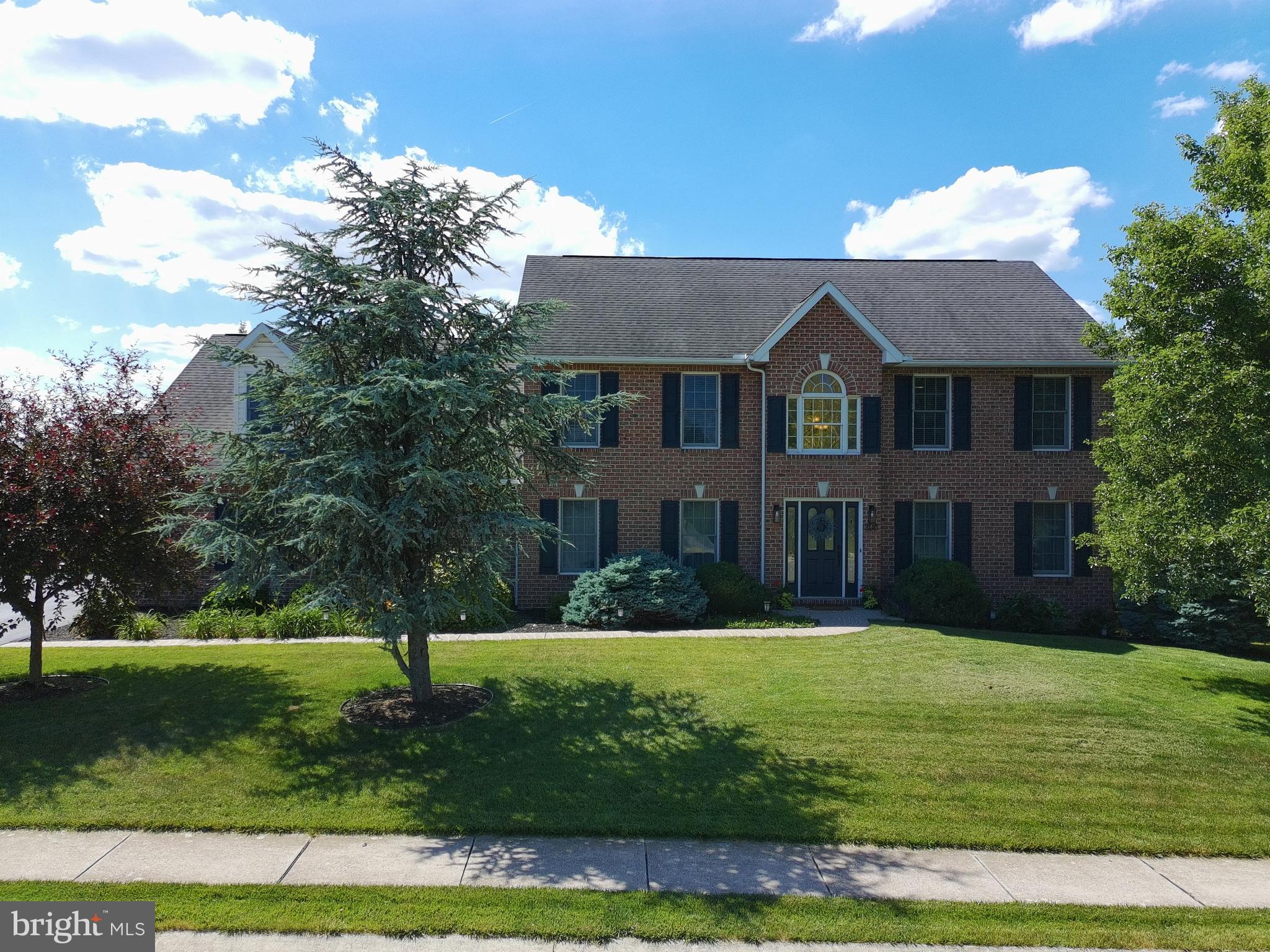 Beautifully maintained and move-in ready, this 4-bedroom, 3.5-bath all-brick Colonial is located in the desirable Maple Run community! Step inside to a dramatic two-story foyer that leads to formal living and dining rooms with hardwood flooring. The kitchen is ideal for everyday living and entertaining, featuring a center island, breakfast area, and ceramic tile floors. Relax in the family room with a gas fireplace ready to enjoy. On the upper level, you'll find four generously sized bedrooms and three full baths, including the primary suite with an attached full bath. Also enjoy the oversized attached three-car garage, low-maintenance deck, and beautifully landscaped yard with mature trees surrounding the lot for added privacy. The bright walkout basement offers great natural light and endless potential for additional living space, recreation, or storage. Conveniently situated just minutes from I-81, shopping, dining, and downtown amenities! Sellers will be providing the new buyer a one-year warranty from 2-10 for peace of mind at closing. ** Additional photos to come **