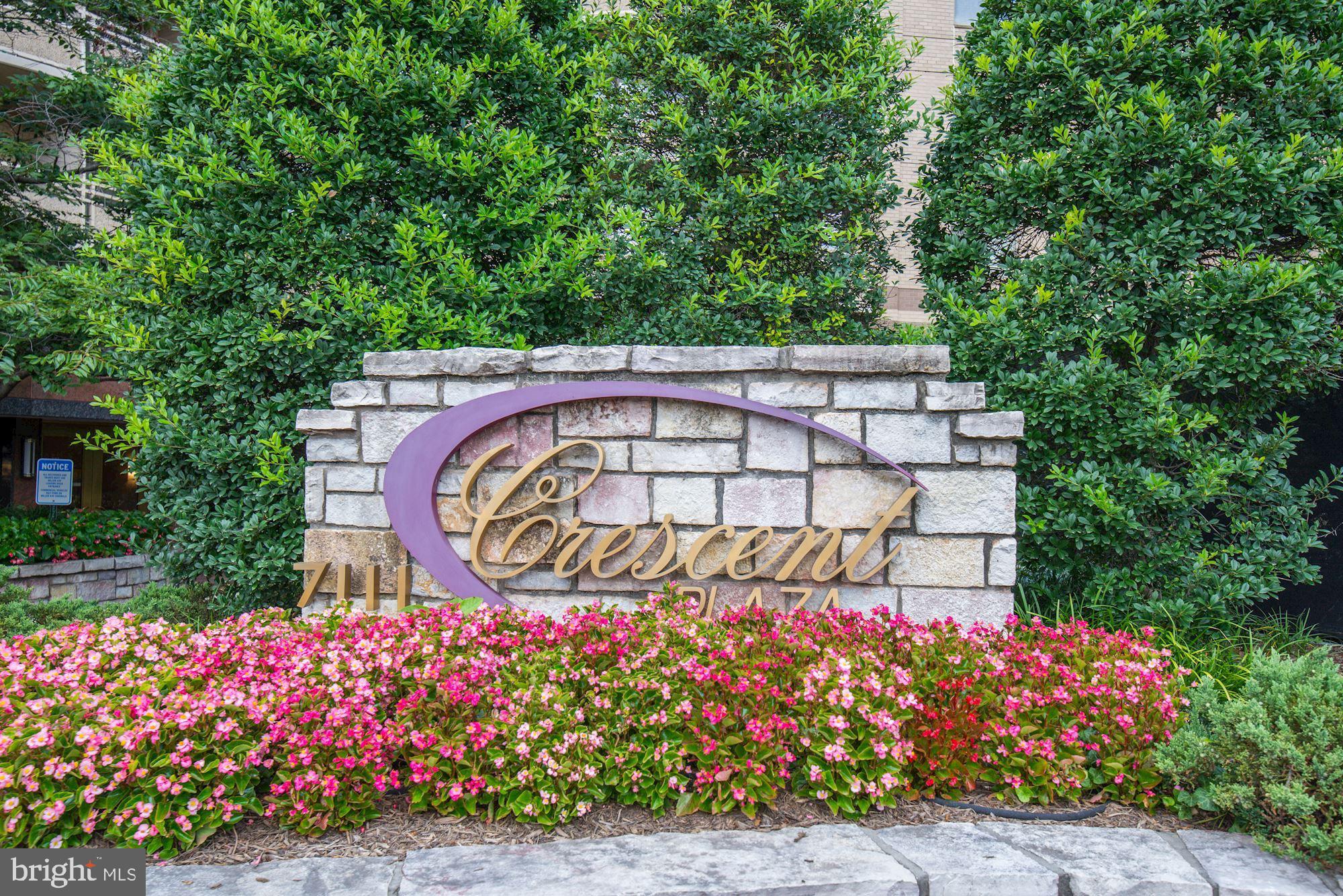 Fabulous 1bd/ba condo in Downtown Bethesda at the Bethesda Crescent. Lovely residential views of the front of the building from the balcony. Highlights: freshly painted, hardwood floors, great kitchen with granite and ss appliances, full size washer/dryer, spacious rooms and garage parking (Space# 235A on B2). Condo fee includes gas, water, fitness, parking, sewer, lawn care, snow and trash removal. Common areas and fitness center will undergo a renovation from healthy building reserves. Pet friendly building (40lb or less). Only 0.3 miles to Bethesda Metro Station. The Capital Crescent Trail is across the street from the building. Steps to Bethesda Row and all that it offers of amazing retail and restaurants.