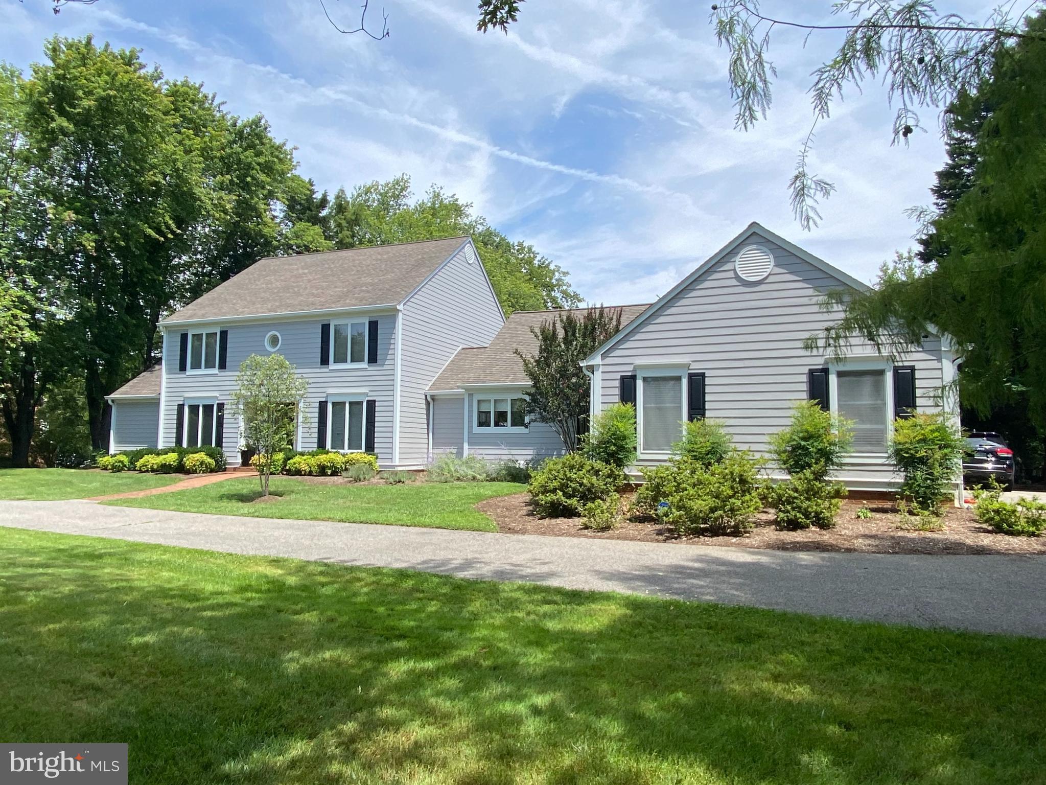 This Stunning five-bedroom, three full and two half bath home in the coveted community of The Downs on the Severn presents a high-quality interior that is functional, elegantly appointed, and exquisitely crafted. With over 3,900 finished square feet of remarkable living spaces, the residence offers an open floor plan featuring a main level primary with en-suite marble bath, grand formal living room with wood-burning fireplace, an open and inviting family room with vaulted ceiling and 2023 energy efficient regency wood burning fireplace as well as an exquisite formal dining room with butler s pantry. The gourmet kitchen features beautiful granite, La Cornue Royal Blue range, custom cabinetry and storage solutions with stainless appliances. The main level is completed by a cherry paneled library and two powder rooms, one of which is elegantly adorned with hand-painted de Gournay chinoiserie wall coverings and refinished hardwood flooring throughout the main level.  The second level hosts four bedrooms, one of which is currently being used as an expansive Den with window seat and built-ins as well as a great storage area.   Top of the line exterior improvements - 2021 Hardie Plank siding of the entire house, new trim, soffit, gable end louvers and shutters, gutters.  Flagstone patio and lights and integrated deck lighting, custom built mahogany deck(16x28) by Brightview Builders with all new concrete footings, 2023 new driveway installed.    Lots of recent improvements - see Property Feature list.   The home is perfectly sited on a 1.23 acre lot, with panoramic winter water views of the Severn River.  The Downs on the Severn is a residential community encompassing 335 acres, with fine amenities that include a clubhouse, outdoor pool, tennis courts, playground and two marinas on a peninsula between Clements and Brewer Creeks, with deep-water access to the Severn River and the Chesapeake Bay.