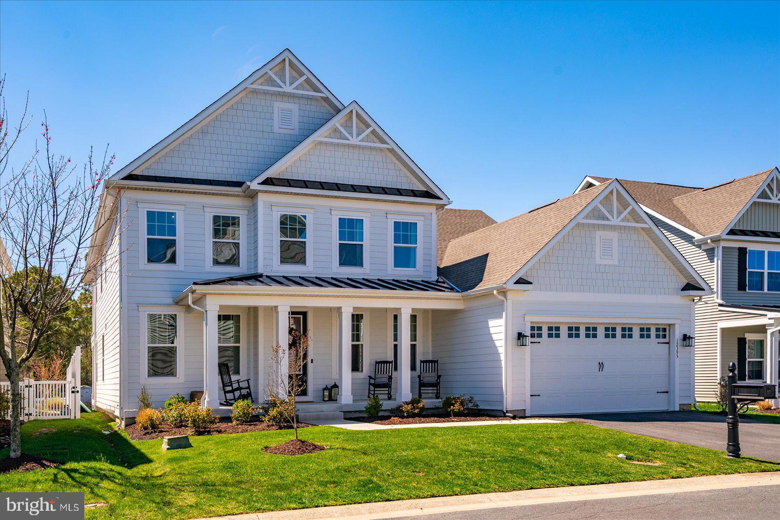 Welcome to this beautifully designed, nearly new home in the highly sought-after Bayside community in Berlin. Built in 2023, this stunning coastal retreat showcases modern finishes, thoughtful design, and a seamless blend of comfort and style.

Step inside to a bright, free-flowing floor plan featuring an open living and dining space—perfect for entertaining or everyday living. The heart of the home is the spacious gourmet kitchen, complete with quartz countertops, a large center island, stylish backsplash, gas stove, and pot filler—designed to impress both chefs and guests alike.

Upstairs, unwind in the expansive primary suite, highlighted by a tray ceiling, a large walk-in closet, and a luxurious en-suite bathroom with dual vanities, tiled flooring, and a beautifully tiled glass-enclosed shower. A large upper-level balcony offers the perfect place to relax and take in the peaceful surroundings.

Enjoy outdoor living with a generously sized backyard and serene water access with picturesque water views—ideal for quiet mornings or evening gatherings.

Ideally located just minutes from Assateague Island, as well as the beaches and iconic Ocean City Boardwalk, this home places you close to the very best of the Eastern Shore. You’re also a short drive to downtown Berlin and the popular dining, shopping, and entertainment options in West Ocean City.

Residents of Bayside enjoy an impressive array of resort-style amenities, including indoor and outdoor pools, a fitness center, tennis courts, and more—offering a true vacation lifestyle year-round.

Whether you're searching for a primary residence, second home, or investment opportunity, this move-in ready home delivers the perfect combination of location, luxury, and coastal living.