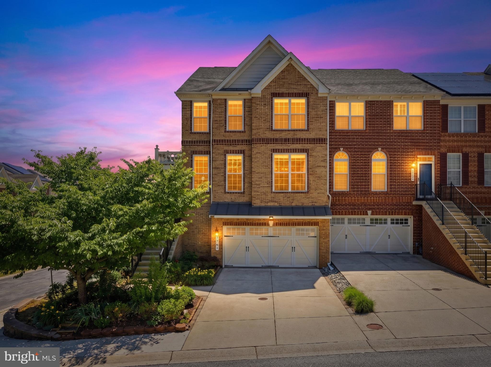Have you ever seen a townhome with nearly 3,800 SQFT? This rare, end-unit gem by Toll Brothers is tucked away on a quiet street in the most desired community The Enclave at Arundel Preserve. Perfectly positioned on a premium homesite with an extended driveway, mature landscaping, and established trees, this exceptional residence offers the privacy, scale, and lifestyle of a single-family home with a turnkey, low-maintenance footprint.

From the moment you step inside, stunning upgraded oak flooring flows seamlessly throughout the main level, bringing warmth and sophistication to every room. The thoughtfully designed layout maximizes natural light and functionality, creating an airy, open feel that lives incredibly large. Custom 42" oak cabinetry adds rich character and craftsmanship to the gourmet kitchen and living spaces, while updated mechanicals deliver true move-in-ready peace of mind. As a coveted end-unit, the home enjoys enhanced privacy, extra windows, and an abundance of sunlight all day long.

The fully finished walkout lower level is a destination of its own, offering nearly 1,300 square feet of additional flexible living space. Complete with a spacious recreation room, full bedroom, full bathroom, and a built-in kitchenette, it is ideal for long-term guests, multi-generational living, a premium home office, or a fitness studio. The walkout opens directly to a serene outdoor oasis framed by mature trees, hydrangeas, and a beautifully planted rose garden—delivering a level of tranquil greenery rarely found in townhome living.

Major Recent Upgrades Include:

BRAND NEW Water Heater (2026)
NEW Light Fixtures (2026)
NEW Refrigerator (2025)
Freshly Painted in a neutral designer palette (2025)
NEW Roof (2021)
Completed Basement Suite & Kitchenette (2018)

Residents of The Enclave enjoy resort-style community amenities just steps from the front door, including a state-of-the-art fitness center, tennis courts, an outdoor swimming pool, and playgrounds. The location is unmatched—moments from Arundel Mills, Costco, the MARC commuter rail, and major commuter routes (MD-100, MD-295, and I-295), offering effortless access to Fort Meade, BWI Airport, Baltimore, Annapolis, and Washington, D.C.

7761 Crystal Brook Way delivers the ultimate combination of single-family scale, designer finishes, smart capital updates, and a premier location. Welcome home to a true Hanover masterpiece!