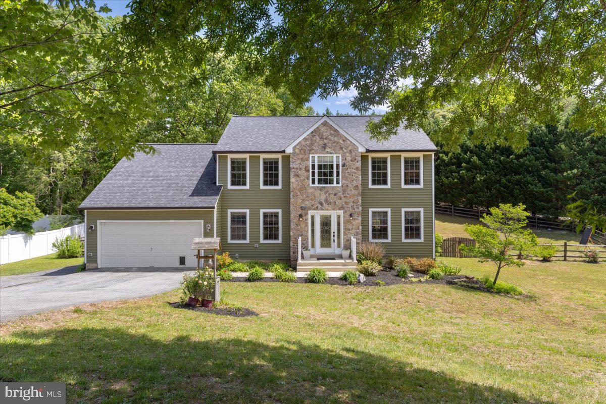 This exceptional Colonial offers the ideal combination of timeless style, generous living space, and modern improvements. Featuring 4 spacious bedrooms and 3.5 baths, this move-in ready home is designed for both everyday living and effortless entertaining. The beautifully appointed kitchen features new granite countertops, ample cabinetry, and generous workspace while opening seamlessly to the home’s comfortable and inviting living areas.  Upstairs, you’ll find four generously sized bedrooms offering ample space and comfort, along with an upgraded bathroom that adds a fresh, modern touch. The fully finished basement provides exceptional additional living space perfect for a recreation room, home office, gym, or guest retreat. Step outside to enjoy the expansive rear deck overlooking a large backyard with plenty of room to relax, entertain, or play. Major recent improvements offer added peace of mind, including a new roof and siding in 2023 and Heat Pump replacement in 2025. Complete with an attached garage and located in a desirable cul-de-sac setting, this home combines privacy, functionality, and updated style in a fantastic location.