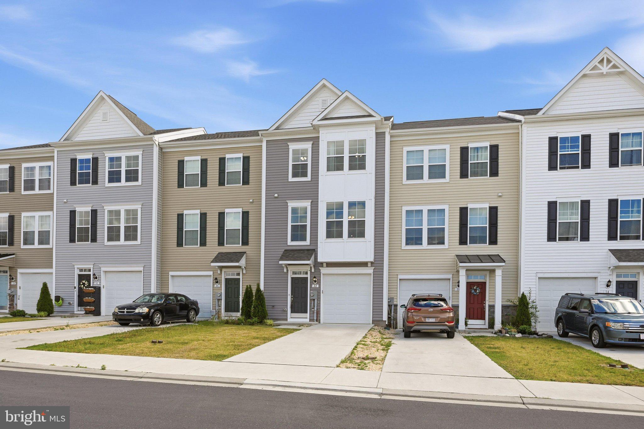 This beautifully maintained townhome offers the perfect blend of style, space, and functionality.  The heart of the home is the stunning kitchen featuring a large center island, ample cabinetry, and plenty of workspace for cooking, entertaining, and everyday living. The open-concept layout creates a seamless flow between the living, dining, and kitchen areas, while abundant natural light enhances the home's inviting atmosphere. The finished lower level provides exceptional flexibility and includes a full bathroom along with a spacious bonus room that can be utilized as a home office, recreation room, media room, fitness area, guest space, or potential 4th  bedroom.  Step outside to enjoy the fully fenced backyard, offering privacy and room for outdoor relaxation, pets, gardening, or entertaining.  This move-in-ready home combines comfort, convenience, and versatile living space in one exceptional package.  Schedule your private showing today!