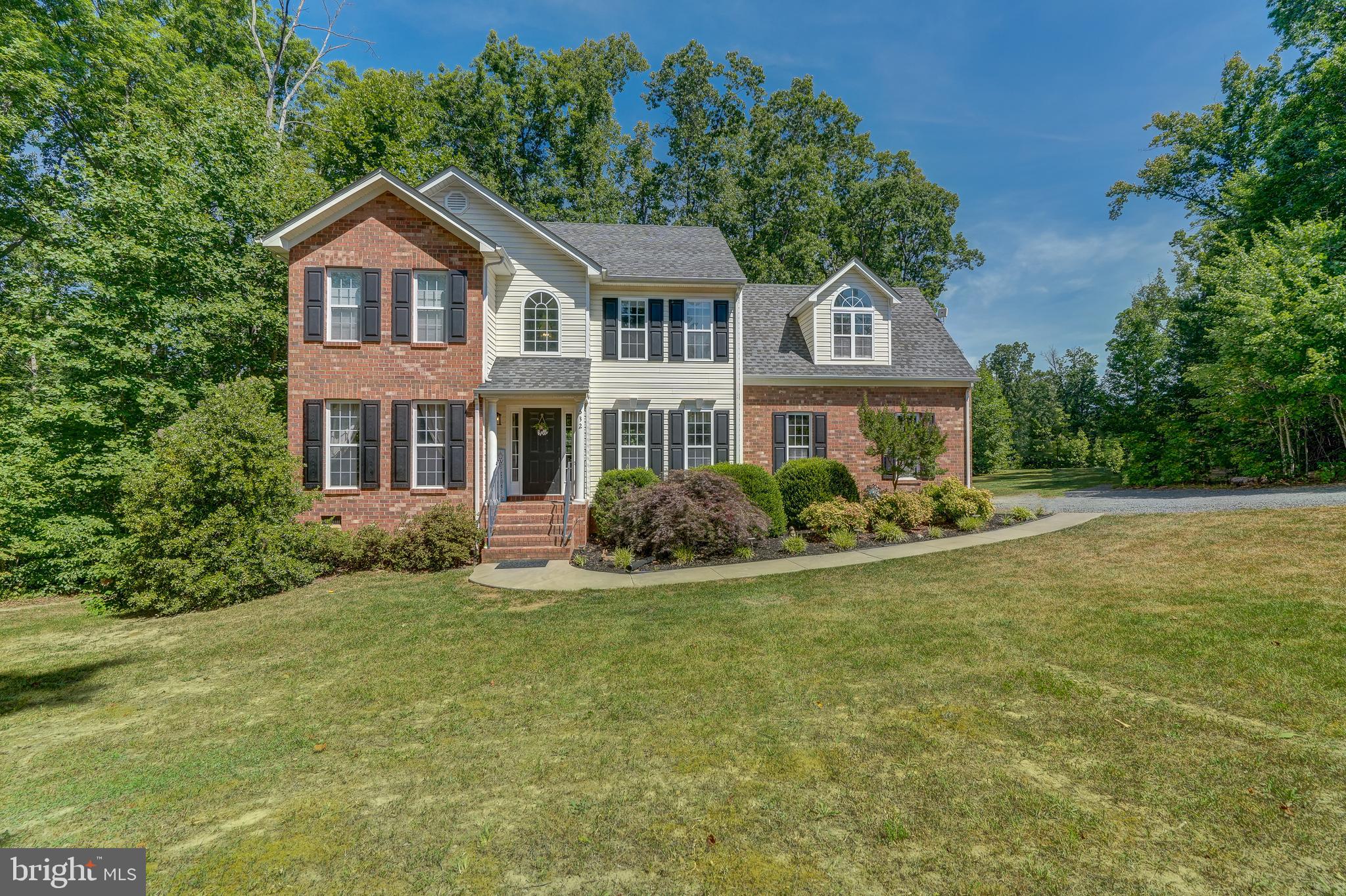 Welcome home to this beautiful colonial-style home nestled on a spacious 1-acre corner lot in the coveted Reedy Creek subdivision. Conveniently located less than 5 minutes from I-64, this property offers easy access to both local amenities and major commuting routes.  Offering 2,500 square feet of finished living space, this well-appointed residence features 4 bedrooms and 2.5 baths, providing plenty of room for comfortable living and entertaining.  This home also has high speed fiber Firefly!  The main level features hardwood flooring throughout and a spacious open floor plan.  The kitchen with stainless steel appliances and a center island is open to the light filled breakfast room and the family room that has a gas fireplace with custom mantle.  Separate formal dining room with crown molding, chair rail and a tray ceiling.  Upstairs the primary ensuite showcases vaulted ceilings, a walk-in closet, double vanity, jetted tub and separate shower.  There are 3 additional bedrooms, a full bath and laundry on the second level.  New light fixtures, hardware and the downstairs HVAC unit replaced.  Outside, the property offers a fun, above-ground pool, ideal for cooling off and enjoying lazy summer days, and there is a back deck for grilling.  The expansive yard provides plenty of space for outdoor activities, gatherings and gardening.  Come see for yourself.  You'll want to make this inviting property your new home sweet home!