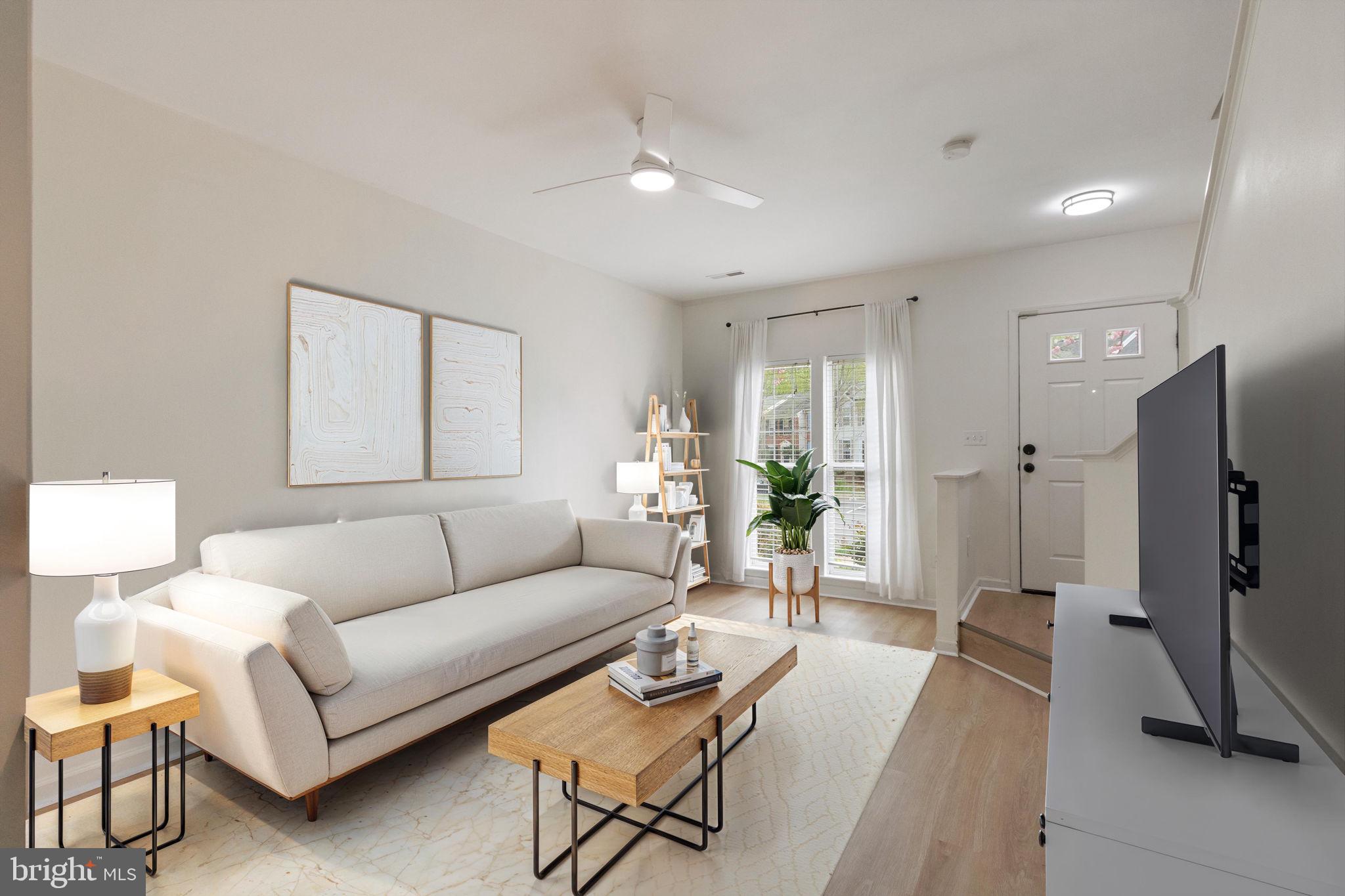 Welcome to your dream townhome in the highly desirable Ashland Community! This beautifully updated 2-bedroom, 2.5-bath home offers approximately 1,700 square feet of thoughtfully designed living space across three levels, perfect for modern living. Nestled in a family-friendly neighborhood renowned for its top-rated schools, this home combines convenience, amenities, style, and comfort in one unbeatable package with a Price Improvement!

Step inside to a bright entry that leads to an open-concept main level, featuring brand-new LVP flooring throughout. The spacious living room (or home office) is bathed in natural light, thanks to large windows that cast a warm glow across the space—perfect for relaxing or entertaining. Adjacent to the living area, seamlessly flows into a modern kitchen and dining area with sleek stainless steel appliances (including a newer fridge, gas stove, dishwasher, and new microwave). Crisp white cabinetry, ample counter space, and a window overlooking the backyard make this kitchen as functional as it is stylish! 

Upstairs, the second floor boasts a large family room with gas fireplace, 2nd floor deck, along with a updated full bathroom and a generously sized 2nd bedroom. The third floor is home to the primary bedroom suite, complete with XL walk-in closet and a beautifully updated full bathroom featuring LVP flooring, newly glazed tiles and modern fixtures. Both upstairs bathrooms have been refreshed with new flooring and contemporary touches, ensuring a spa-like experience. The primary suite has proper square footage to convert into 2 bedrooms on this floor, making this a 3 bedroom, 2.5 bath townhouse, providing potential instant equity!

The main level also offers a convenient laundry/pantry area with a newer washer and dryer, a half bath, and access to the backyard, where you’ll find a lovely Belgard Origins Mountain Mist paver patio—perfect for morning coffee or evening barbecues. Shed conveys! Exiting the back gate, you will find lots of community green space for playing &/or walking pups and a tot lot for the little ones!

This home has been meticulously updated with Sherwin Williams "Creamy" paint, new light fixtures, and hardware throughout, adding a modern flair to every room. The front landscaping has been recently revamped, enhancing the curb appeal of this charming Ashland townhome. With two assigned parking spaces right out front (10A & 10A) and endless visitor parking, convenience is at your fingertips.

Living in the Ashland Community means access to top-rated schools, nearby parks, and a welcoming neighborhood atmosphere, all while being just minutes from the vibrant amenities of Northern VA. Don’t miss your chance to own this move-in-ready gem in one of the area’s most sought-after communities—schedule your tour today!