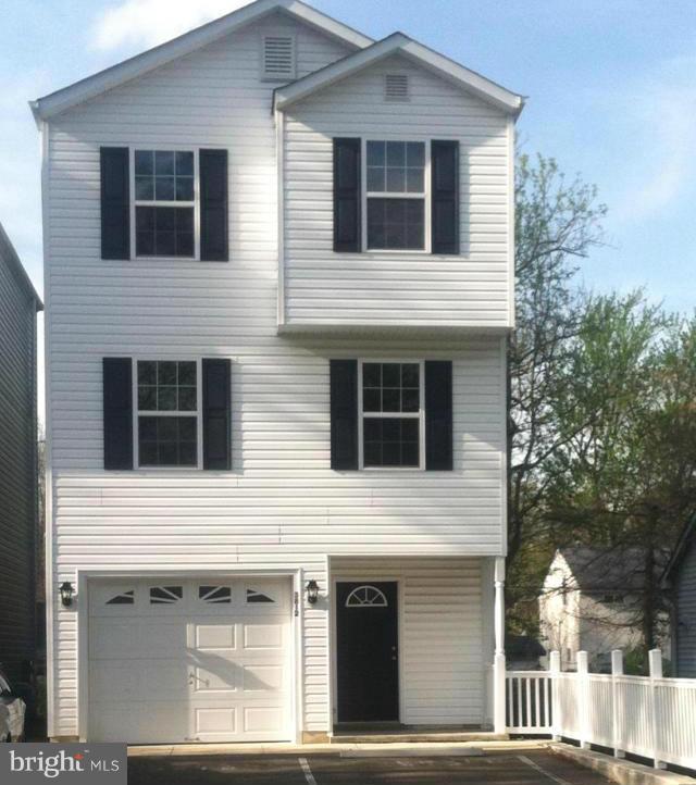 Nice open floor plan.  Lots of closet space in Master Bedroom. Garage door opener with a garage door in the front and one in the back.  Within walking distance to the Chesapeake Bay, Boardwalk, and Beach.  "Pets allowed on a case by case basis with double security deposit.  An approved pet will add an additional $50 per pet to monthly rent." Must have good credit and have proof of all income.