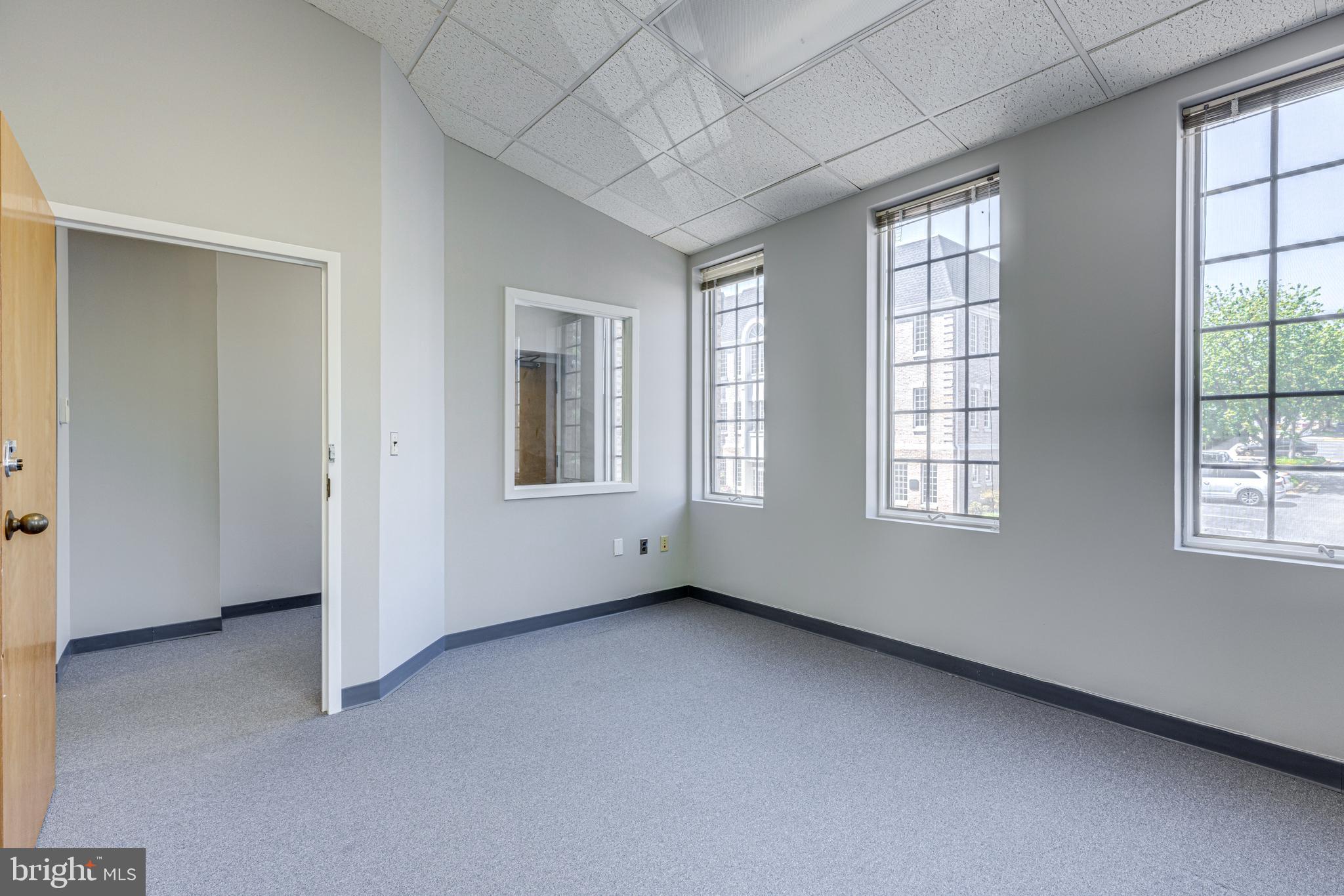 Bright second-floor end unit in Sought-after Fairfax Commons with five total offices, four naturally light-filled offices with vaulted ceilings, a kitchenette with a sink, a bathroom, and a utility closet. New windows. Walking distance to Fairfax Courthouse, in the heart of Old Town Fairfax! It is in excellent condition, has a perfect floor plan, and plenty of unassigned parking. Magnificent Views from each office. Easy Access to the CUE bus(GMU to Vienna Metro Station) & Old Town Village/Main St. Marketplace!! Commercial Condo with CR Zoning.