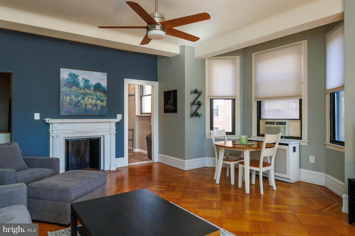 This is a beautifully renovated and maintained corner unit at the Lenox Condominium. This unit is on the southeast corner of the building with great light and views from three bay windows. The kitchen and bathroom have all been completely renovated. The kitchen has custom cabinets, stainless steel appliances, and granite counter tops. There is an entry vestibule that provides an elegant introduction to the bedroom on one end and kitchen, living room and dining area on the other. The living room includes an original decorative mantle, ceiling fan, two bay windows and fantastic southern views. The bedroom has two large closets, ceiling fan, another large bay window and a full bathroom. New washer and dryer were installed last year. The association now allows individual owners to install central air conditioning with prior approval by the board, and many owners have now installed mini-splits. The Lenox Condominium was designed by famed New York architects Clinton and Russell. It was built in 1920 and renovated into condominiums in 2004-5. The units have large scale rooms, high ceilings, lots of windows and most units have their original architectural elements. It is a Doorman building and is centrally located at the southern end of Mid-town Village in the Washington Square West Neighborhood. It is 2 blocks from the great shops, restaurants, theatres and nightlife of Midtown Village, Walnut Street, and the Avenue of the Arts. It is also just a few blocks from Thomas Jefferson and Pennsylvania Hospitals. There are many public transportation options within a few blocks of the Lenox, and the two streets next to the building contain bike lanes. The condominium fees include a 24/7 door staff, heat, hot water, and high-speed internet. The owners pay their own electric and Cable TV. The building offers additional storage for a small fee, and there are many gym options within 2-3 blocks. It is a pet friendly building.  The association plans to replace the three elevators in the next 18 months and the seller plans to pay the assessment in full prior to settlement provided they receive an acceptable offer.