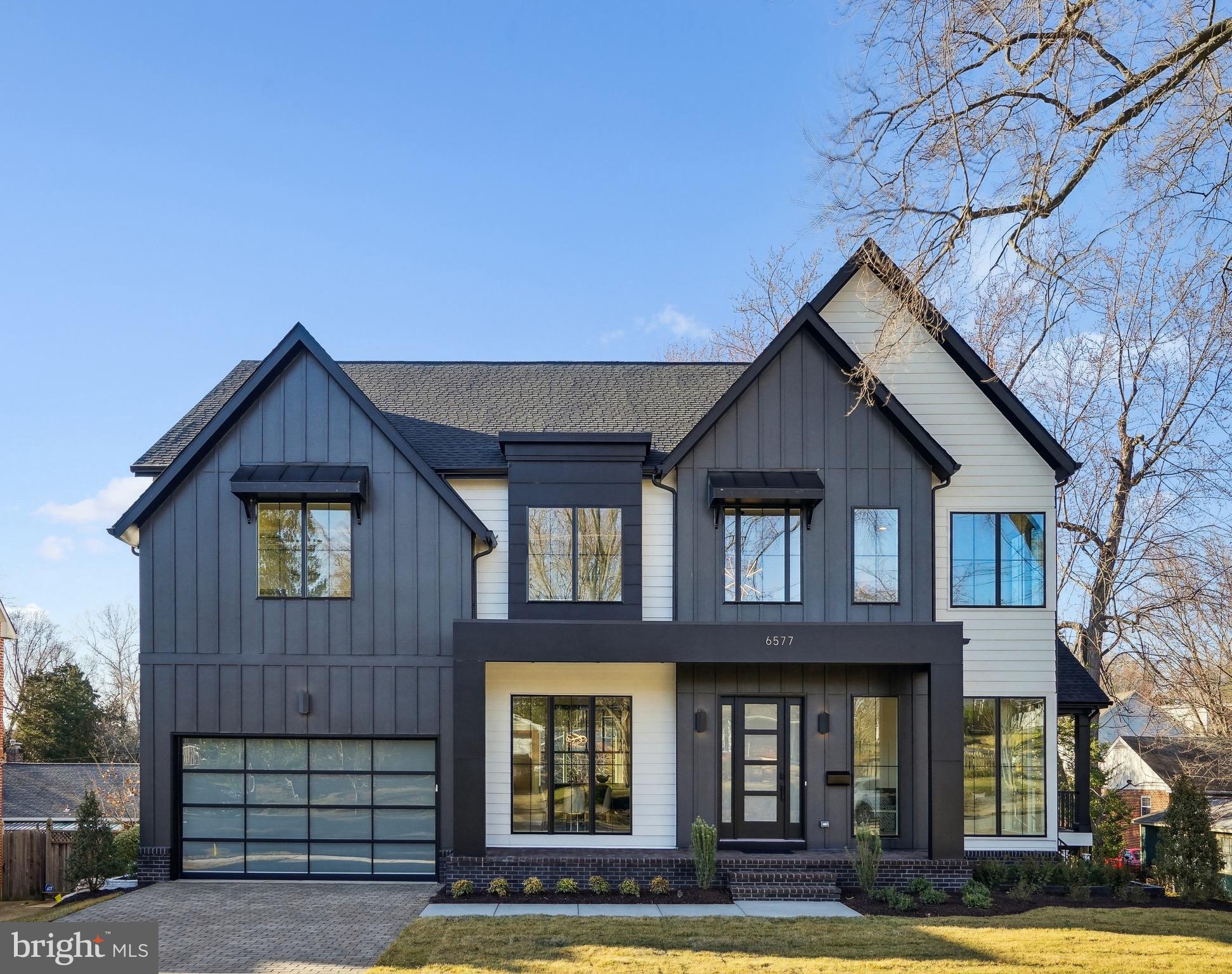 Acclaimed Beaconcrest Homes is proud to present this one-of-kind opportunity located in highly desirable N. Arlington. This custom residence offers over 6,100 gross square feet of abundant luxury and uncompromising detail while sited on a sizable and rare 10,000 plus square foot lot. The spacious main level boasts 10' ceilings, a bright and open foyer that introduces a private study, a formal dining room perfect for at home entertaining, followed by a gourmet designer kitchen that encompasses a stunning working island open to a large breakfast area, and a mud room featuring a second powder room. Luxurious elements such as beamed ceilings, a double sided fireplace shared with the covered porch help define the inviting family room and create a space of unparalleled comfort. The covered side porch, accessible from the family room, offers added livability all while connecting the house with the outdoors. The second level features 4 bedrooms, bedrooms 2 and 3 share a large buddy bath while bedroom 4 offers utmost privacy with an en-suite bath. The owners suite provides the ultimate in comfort and luxury, featuring a large and bright bedroom with a dramatic tray ceiling, a lavish spa like bath with only the finest of finishes, and an abundance of closet space that one will never want to leave. A true retreat! There is also an oversized laundry area that finishes the second level. The lower level offers an impressive 37' x 18' recreational room with LVP flooring and wet bar, coupled with outside access this space is perfect for entertaining. Additionally, a bedroom with full bath and a gym featuring a rubber mat floor are also included in the amazing lower level. Last but certainly not least, this home comes with a two car garage and finish details such as 6" white oak hardwoods throughout, custom cabinetry, high line fixtures, tech wiring, quartz counters and premium materials, this home is truly a unique opportunity not to be missed! Conveniently located to DC, Tysons Corner, Arlington shopping and entertainment, Rte. 66, and Falls Church. Fully completed.