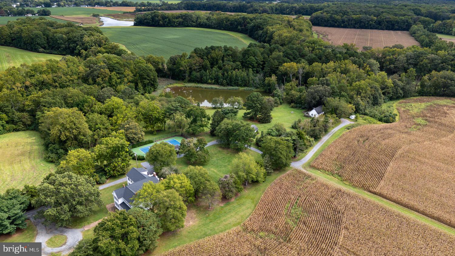 "New Scotland Farm" First time offered in decades! 

This special and unique offering includes 100 +/- acres of prime farm and hunting land, encompassing a spacious farmhouse and  three additional income producing properties, two ponds, and deeded water access with a dock and slip on LaTrappe Creek.  There is the potential for subdivision of 4 lots outside the of the critical area. (buyer to verify)
This offering consists of three  parcels:
Parcel #1 Main House with Rental Properties
21.34 +/- acres improved by a  5BR farmhouse (which includes a separately rented apartment above the garage), two guest cottages that are income producing, and two scenic ponds, one that can be hunted year round.  A newly refurbished tennis court and pavilion overlook the second pond.  The main house, a Victorian style farmhouse, has a brand new roof , geothermal units and outdoor deck. There is a historic section of the home and an addition built in the 1990’s.  The main house also features a separate apartment above the garage for income potential, or ideal for a caretaker. Beautiful setting with mature trees, complete privacy and lovely vistas from several vantage points.
 
Parcel #2 Land 
83+/- acres (65 in till) in agriculture. Farm tenant in place.
 
Community Boat Slip (25% interest)
1.424 +/- acres Deeded boat slip and water access on LaTrappe Creek via shared pier with 3 other homes.

This is a unique property with  an endless potential of uses, from a hunting retreat, private getaway, investment or combination of all.