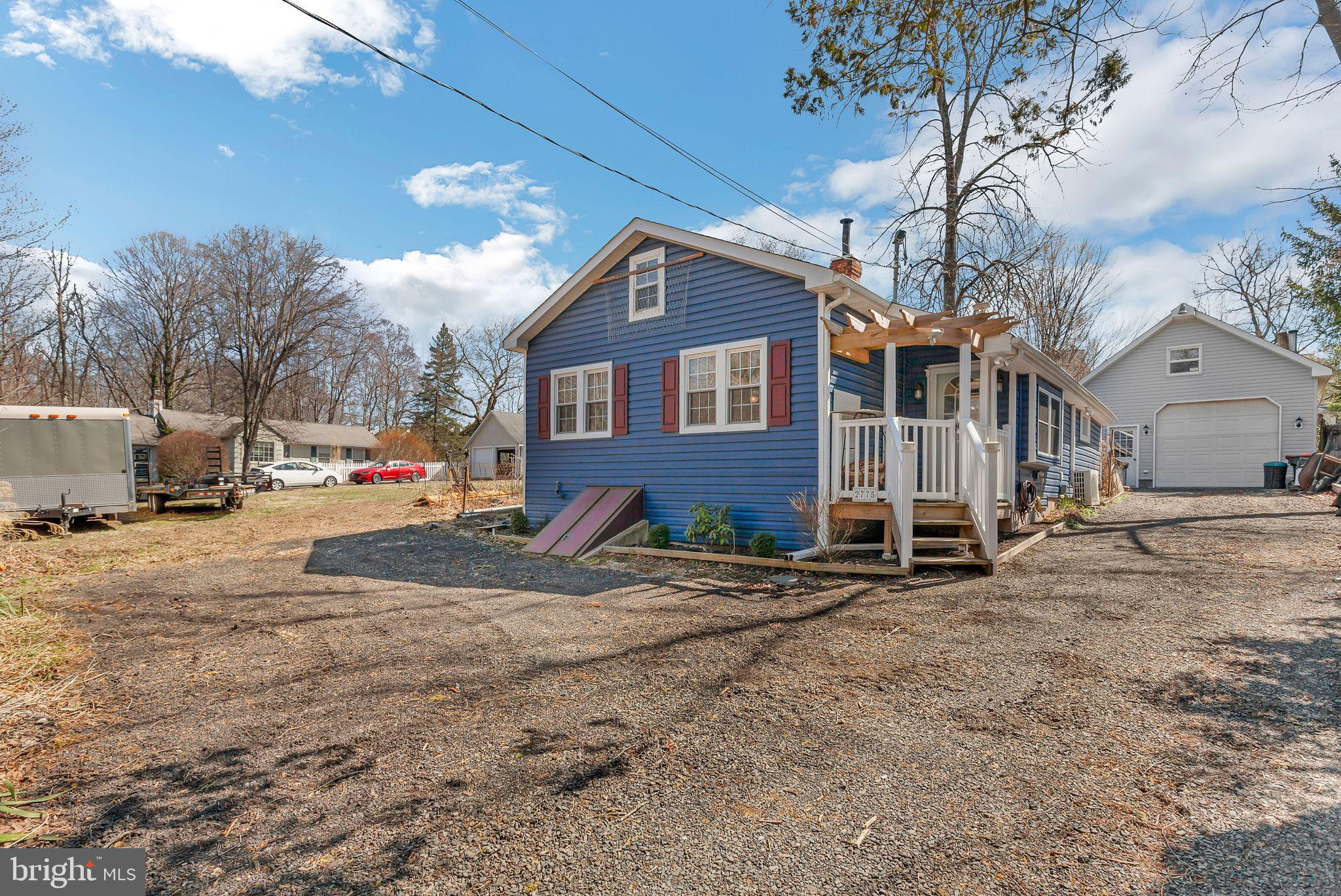 PRICE REDUCED AND BRAND NEW ROOF !  Welcome to your dream home at 2775 Valley Rd in Jamison, PA! This stunning property boasts a custom designed floor plan with 3 bedrooms, 2 full bathrooms and single level living. With a 1-car detached garage and long driveway that can fit numerous vehicles, you'll have plenty of space for all your vehicles and toys.  Perfectly situated in a remote section of Warwick Twp overlooking the water!  

Step inside and be greeted by beautiful ceramic tile flooring creating a warm and inviting atmosphere. The kitchen features tile floors, upgraded hood vent, and plenty of natural light, making it the perfect space for creating culinary masterpieces. The bathrooms have been remodeled with walk-in showers and upgraded fixtures, providing a luxurious retreat for relaxation.

Spacious living room with neutral wall-to-wall carpeting, a cozy fireplace, and large windows offering plenty of natural light and gorgeous views of the surrounding landscape. Outside, you'll find a tranquil koi pond, covered patio, mature trees, and a shaded front porch, perfect for enjoying the outdoors in style.

Owner's suite bedroom was expanded off back of house by 6 feet with vaulted ceilings and its own full bathroom.  Two guest bedrooms are located near front of house with beautiful original hardwood flooring in good condition.  Fully remodeled bathroom is located next to guest bedrooms.  

Additional features include an upgraded 200 amp electrical panel, newer water heater, and heated detached garage for added convenience. The property also offers stunning views overlooking the Neshaminy Creek and a public parking lot just 2 lots over for additional parking options.

NEW ROOF APRIL 2025.  LOW TAXES!  Located in Award Winning Central Bucks School District, this home offers the perfect blend of comfort, convenience, and charm. Don't miss out on this incredible opportunity to make 2775 Valley Rd your new home sweet home. In this home between the wooded rural setting perfectly nestled in the woods and the sound of the water trickling down the creek you will feel like you are up the mountains, yet minutes from all your favorite restaurants, shopping and access to highways.   Close to 202 for an easy commute to Princeton NJ & NYC.  Contact us today to schedule a showing and make your dream home a reality!